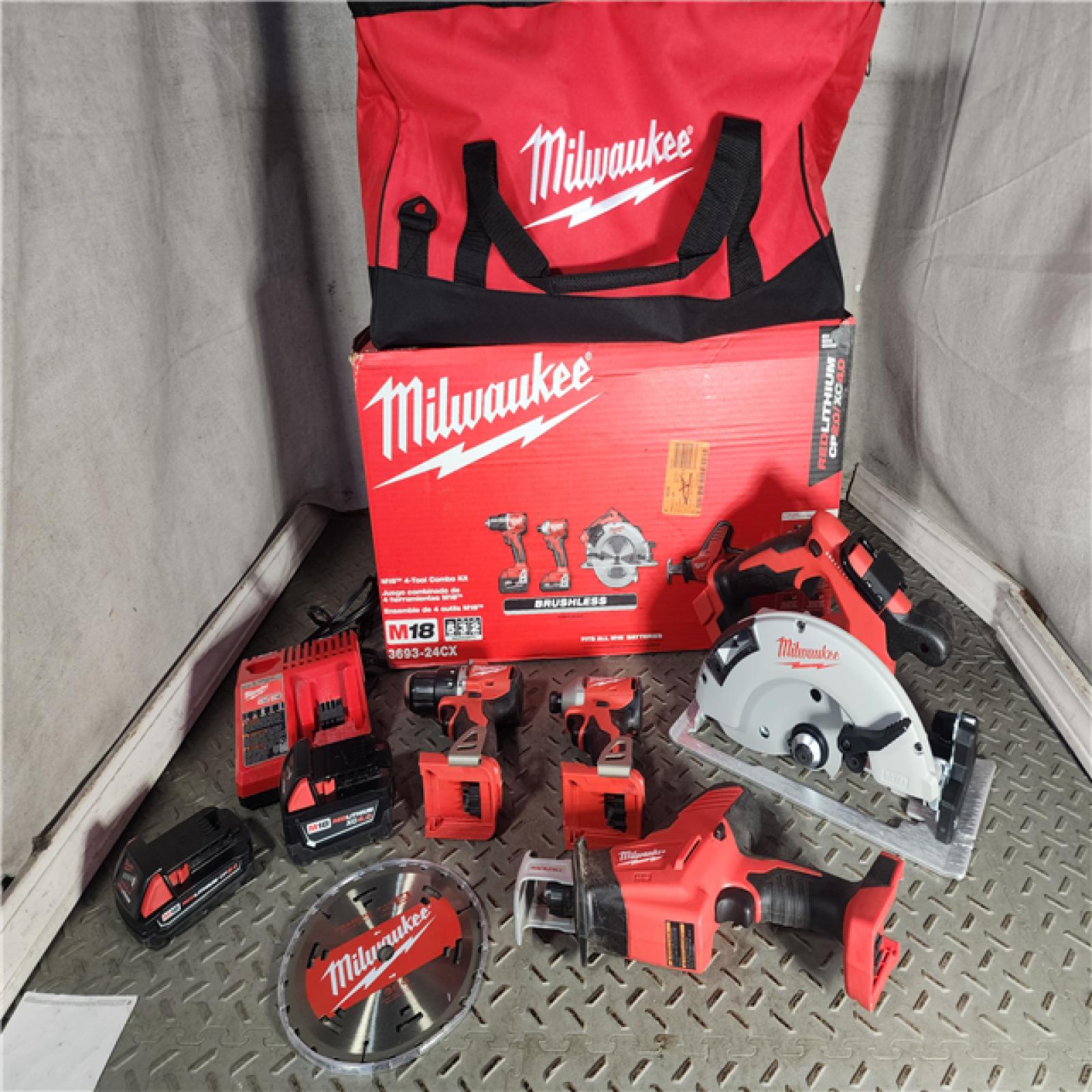 HOUSTON LOCATION - AS-IS M18 18-Volt Lithium-Ion Brushless Cordless Combo Kit (4-Tool) with 2-Batteries, 1-Charger and Tool Bag