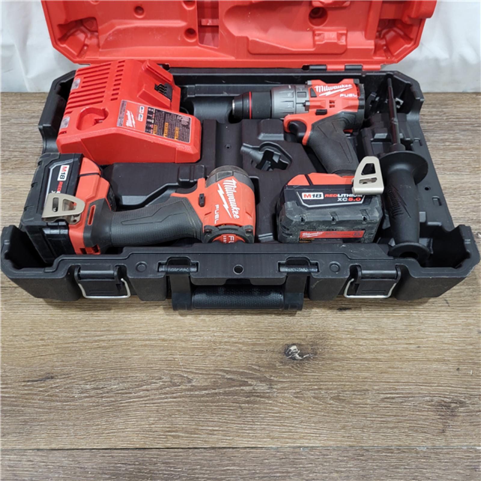 AS-IS M18 FUEL 18V Lithium-Ion Brushless Cordless Hammer Drill and Impact Driver Combo Kit (2-Tool) with 2 Batteries