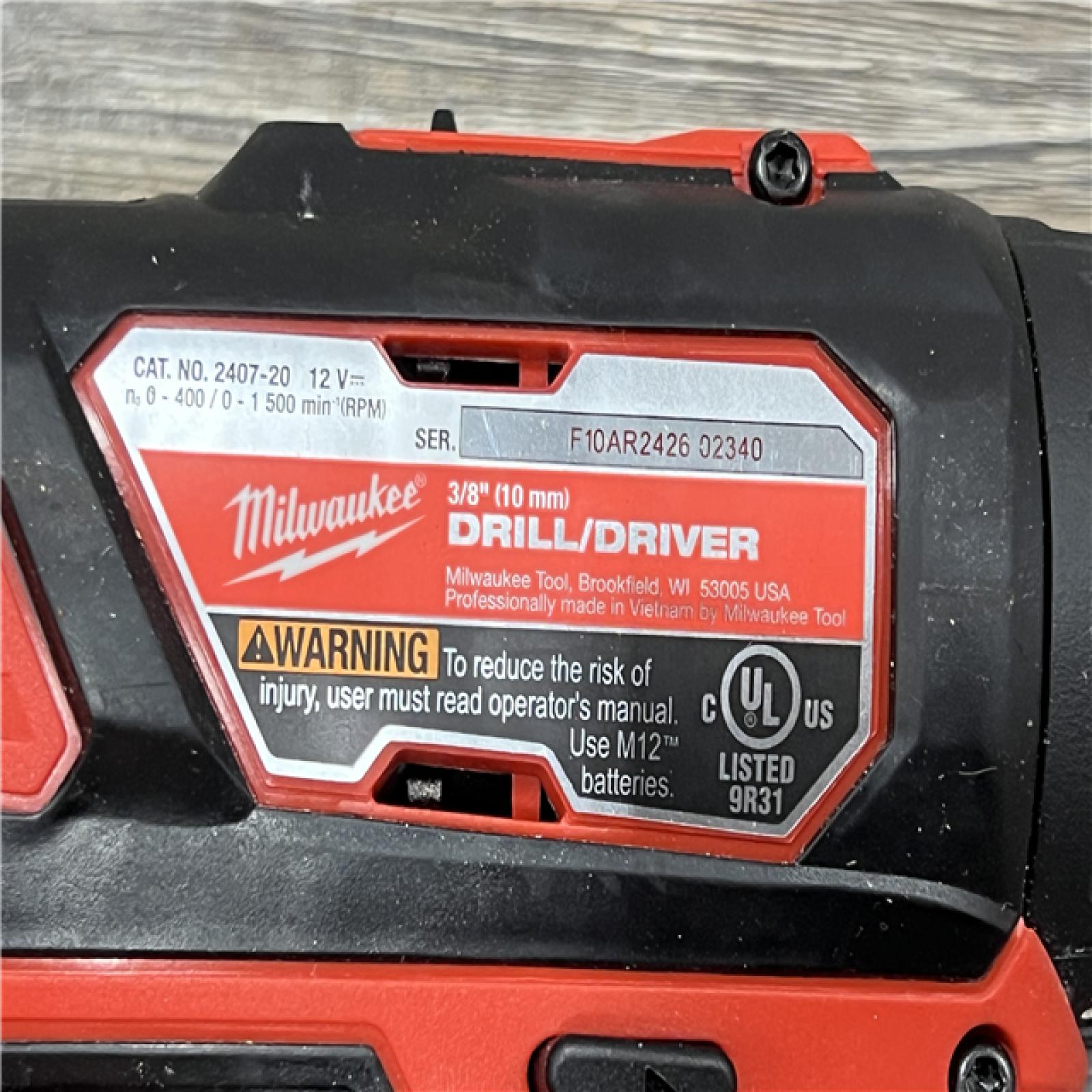 AS-IS Milwaukee 2494-22 M12 Cordless Combination 3/8  Drill / Driver and 1/4  Hex Impact Driver Dual Power Tool Kit (2 Lithium Ion Batteries  Charger  and B