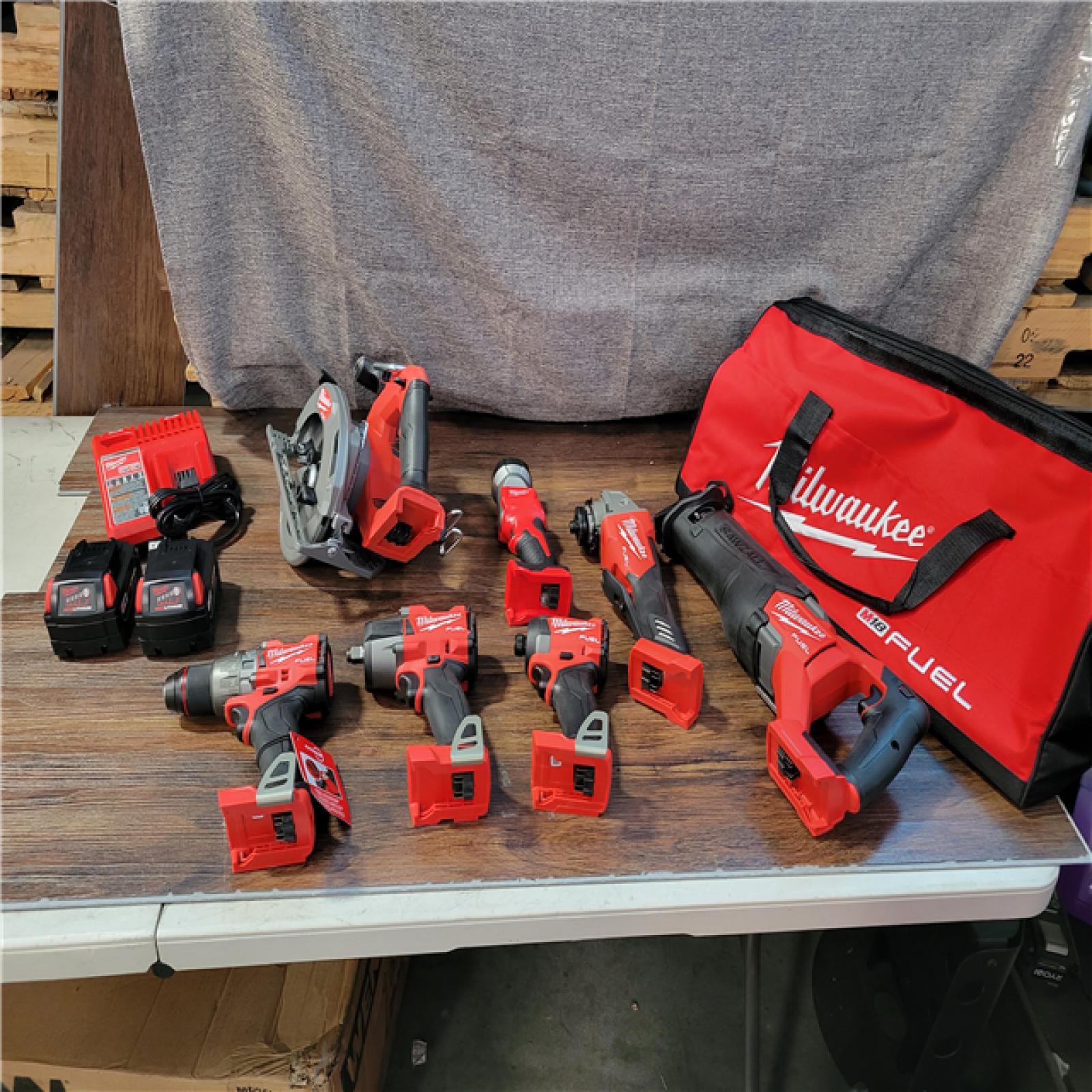 CALIFORNIA NEW MILWAUKEE M18 FUEL 7-TOOL COMBO KIT (2 BATTERIES, 1 CHARGER, AND BAG INCLUDED)