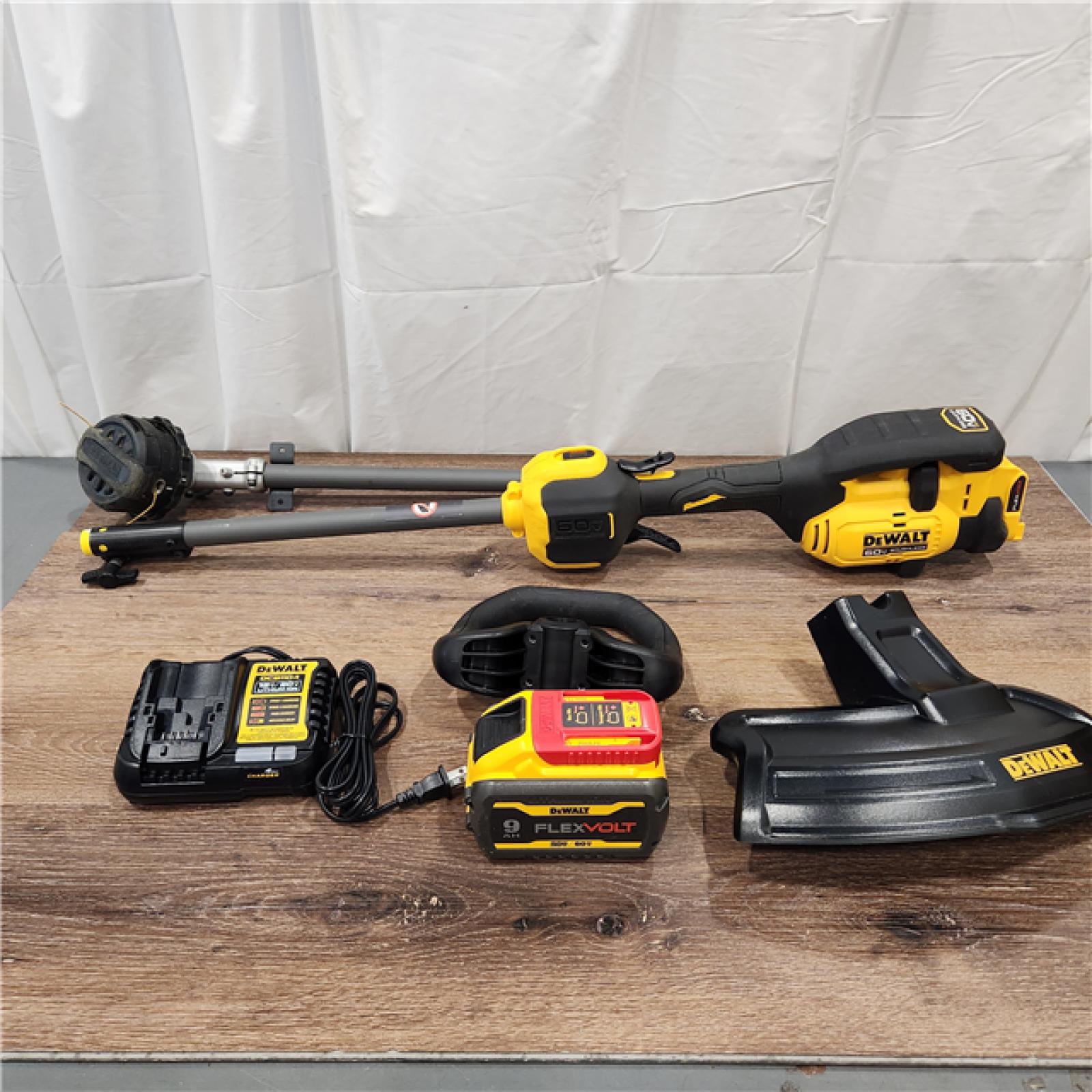 AS-IS FLEXVOLT 60V MAX 17 in. Cordless Battery Powered Attachment Capable Trimmer Kit with (1) FLEXVOLT 3 Ah Battery & Charger