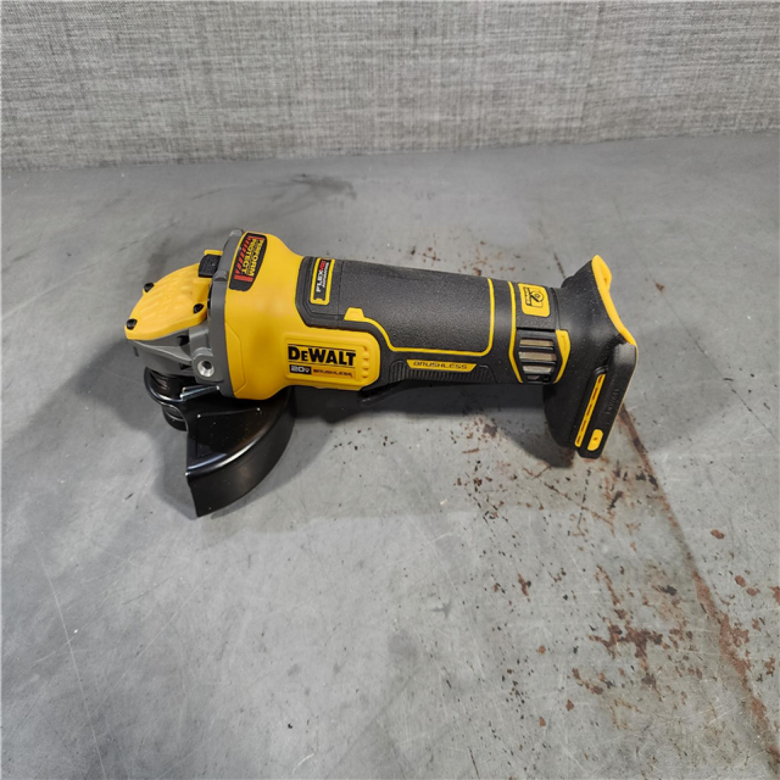 HOUSTON LOCATION - AS-IS DEWALT 20V MAX Cordless Brushless 4.5 - 5 in. Paddle Switch Angle Grinder with FLEXVOLT ADVANTAGE (Tool Only)