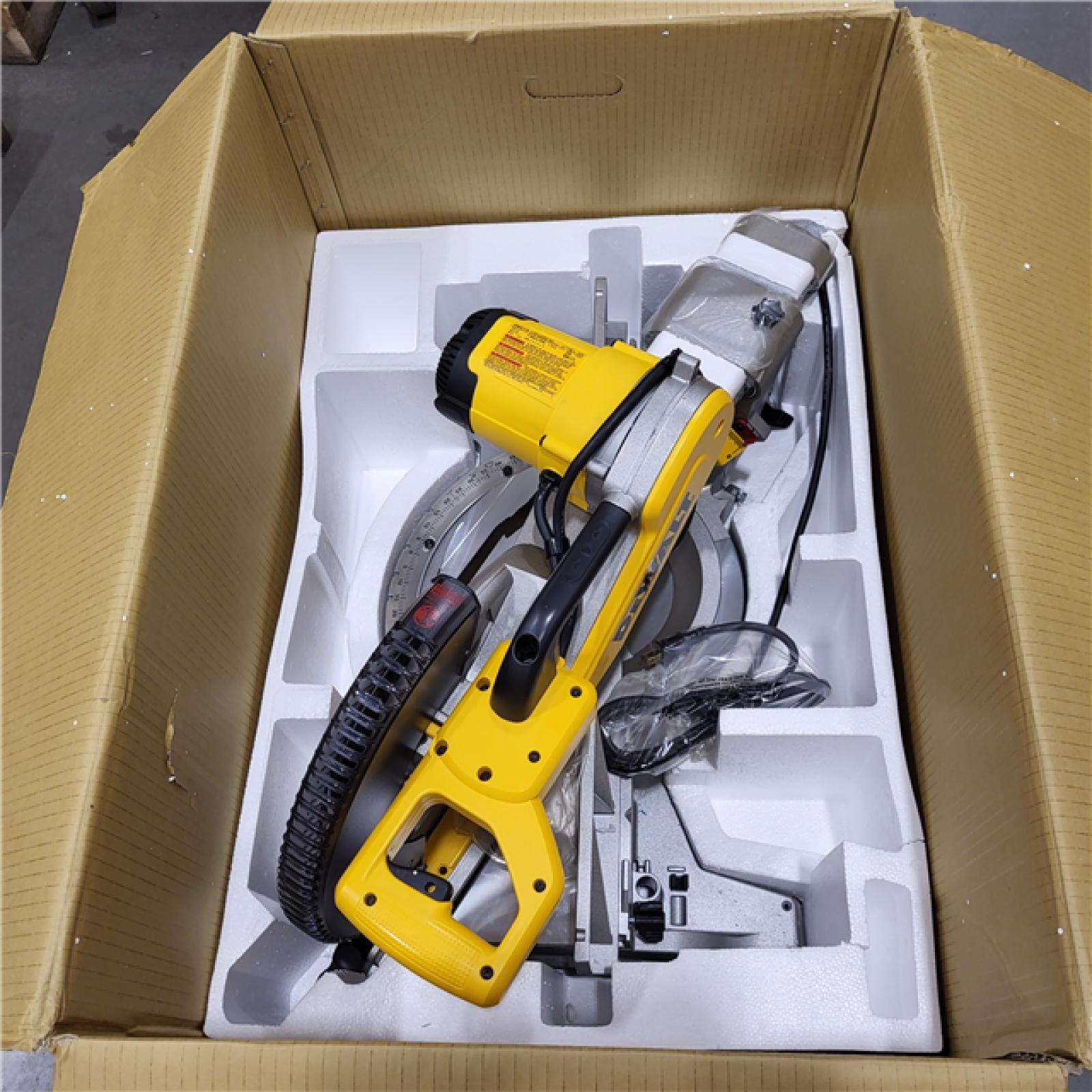 AS-IS DEWALT 15 Amp Corded 12 in. Double Bevel Sliding Compound Miter Saw, Blade Wrench and Material Clamp ( LIKE A NEW CONDITION)