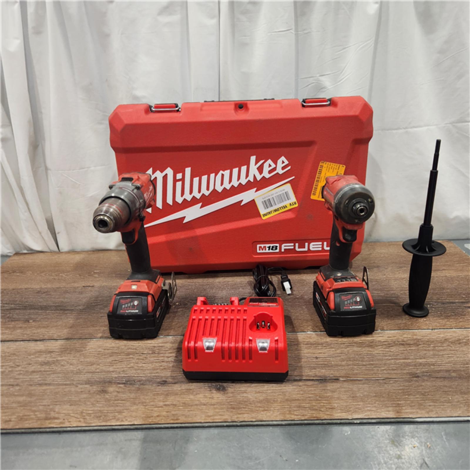 AS IS Milwaukee M18 FUEL 18V Lithium-Ion Brushless Cordless Hammer Drill and Impact Driver Combo Kit (2-Tool) with 2 Batteries