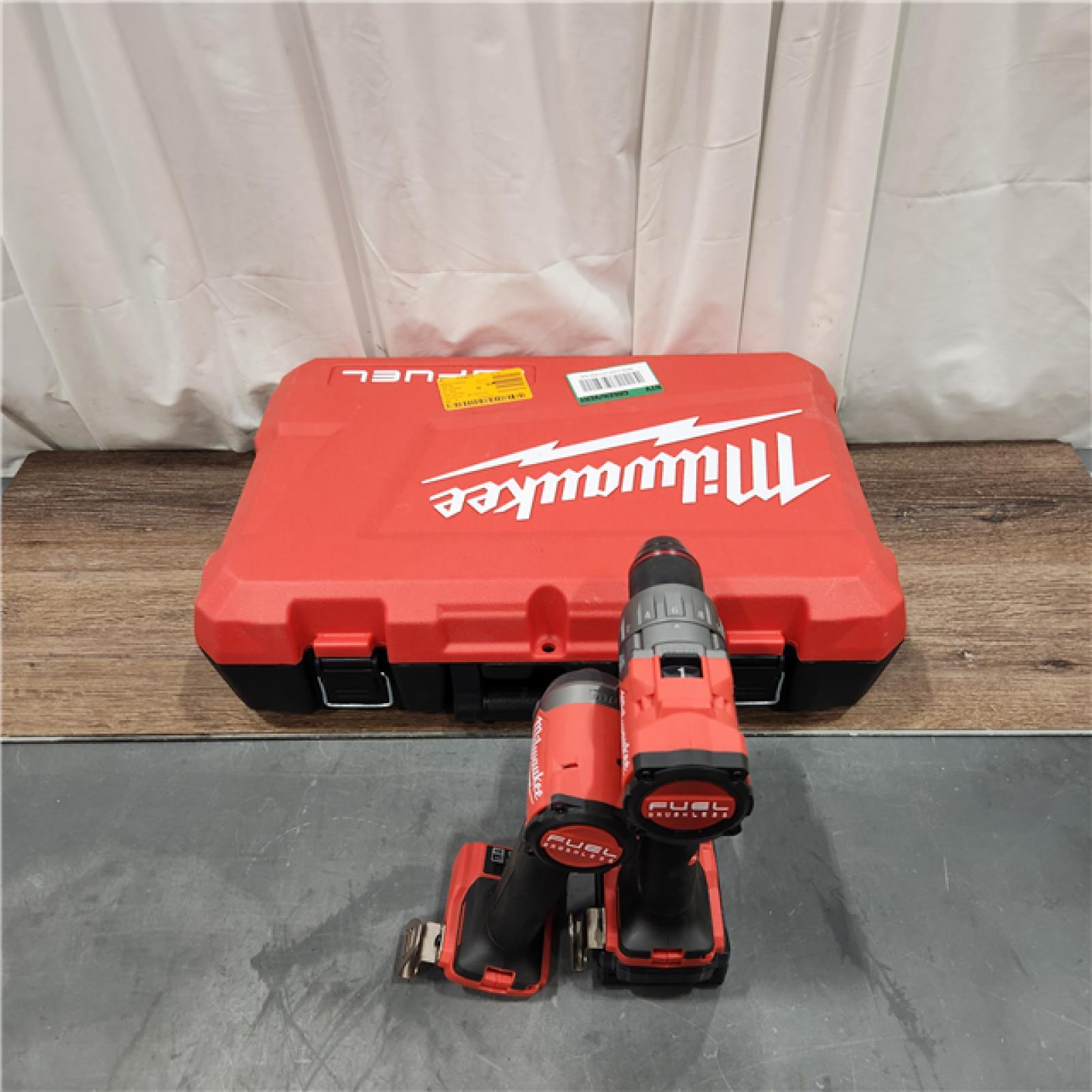 AS IS Milwaukee M18 FUEL 18V Lithium-Ion Brushless Cordless Hammer Drill and Impact Driver Combo Kit (2-Tool) with 2 Batteries