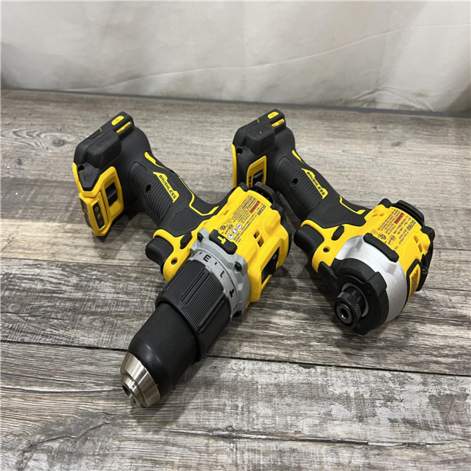 AS-IS DEWALT 20V MAX XR Hammer Drill and ATOMIC Impact Driver 2 Tool Cordless Combo Kit with (2) 4.0Ah Batteries, Charger, and Bag