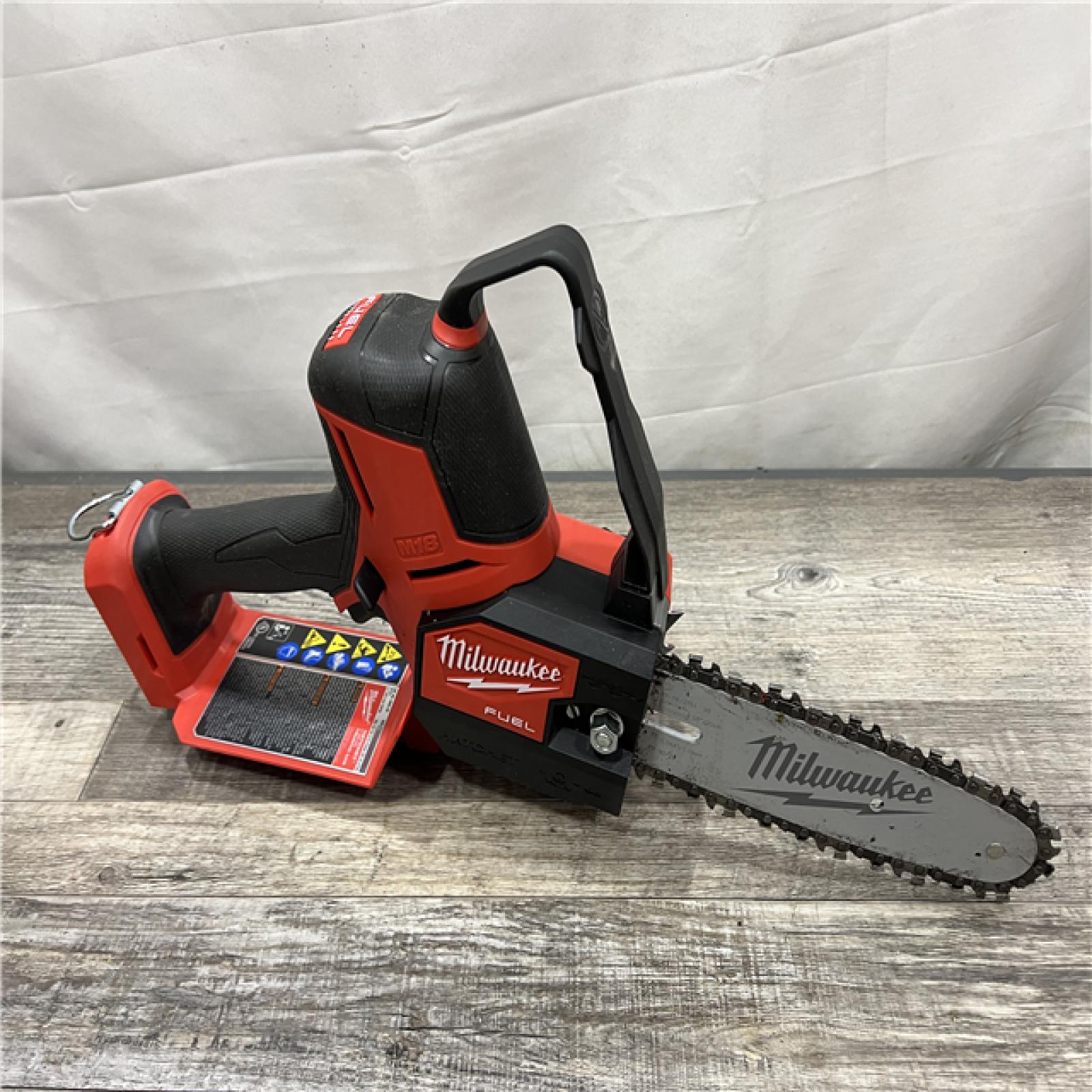 AS-IS MILWAUKEE M18 FUEL 8 in. 18V Lithium-Ion Brushless HATCHET Pruning Saw Kit with 6Ah High Output Battery and Charger