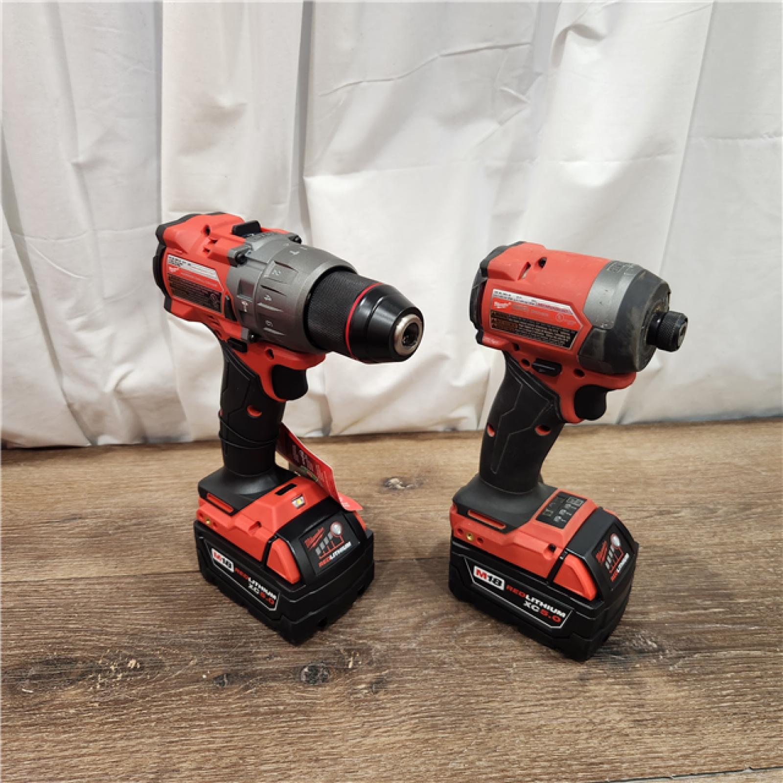 AS-IS Milwaukee M18 FUEL 18V Lithium-Ion Brushless Cordless Hammer Drill and Impact Driver Combo Kit (2-Tool) with 2 Batteries