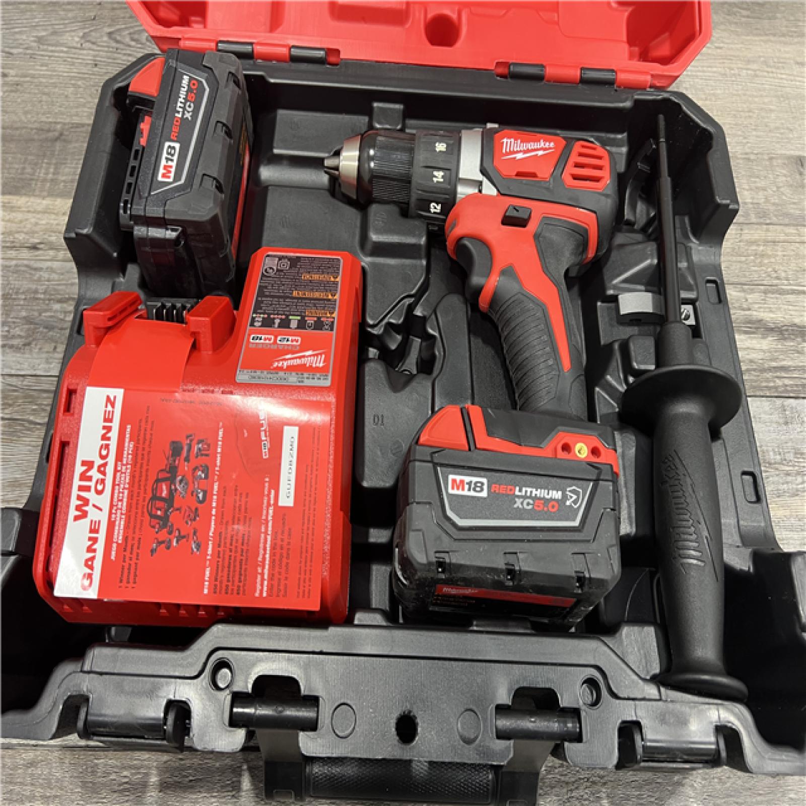 AS-IS Milwaukee 2904-22 Hammer Drill Driver Kit with Batteries  Charger & Tool Case  Red