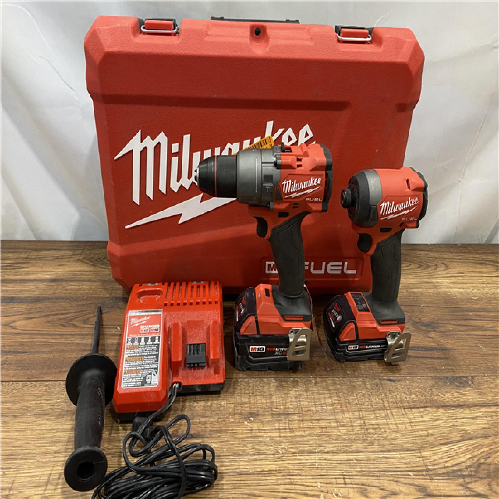 AS IS Milwaukee M18 FUEL 18V Lithium-Ion Brushless Cordless Hammer Drill and Impact Driver Combo Kit (2-Tool) with 2 Batteries