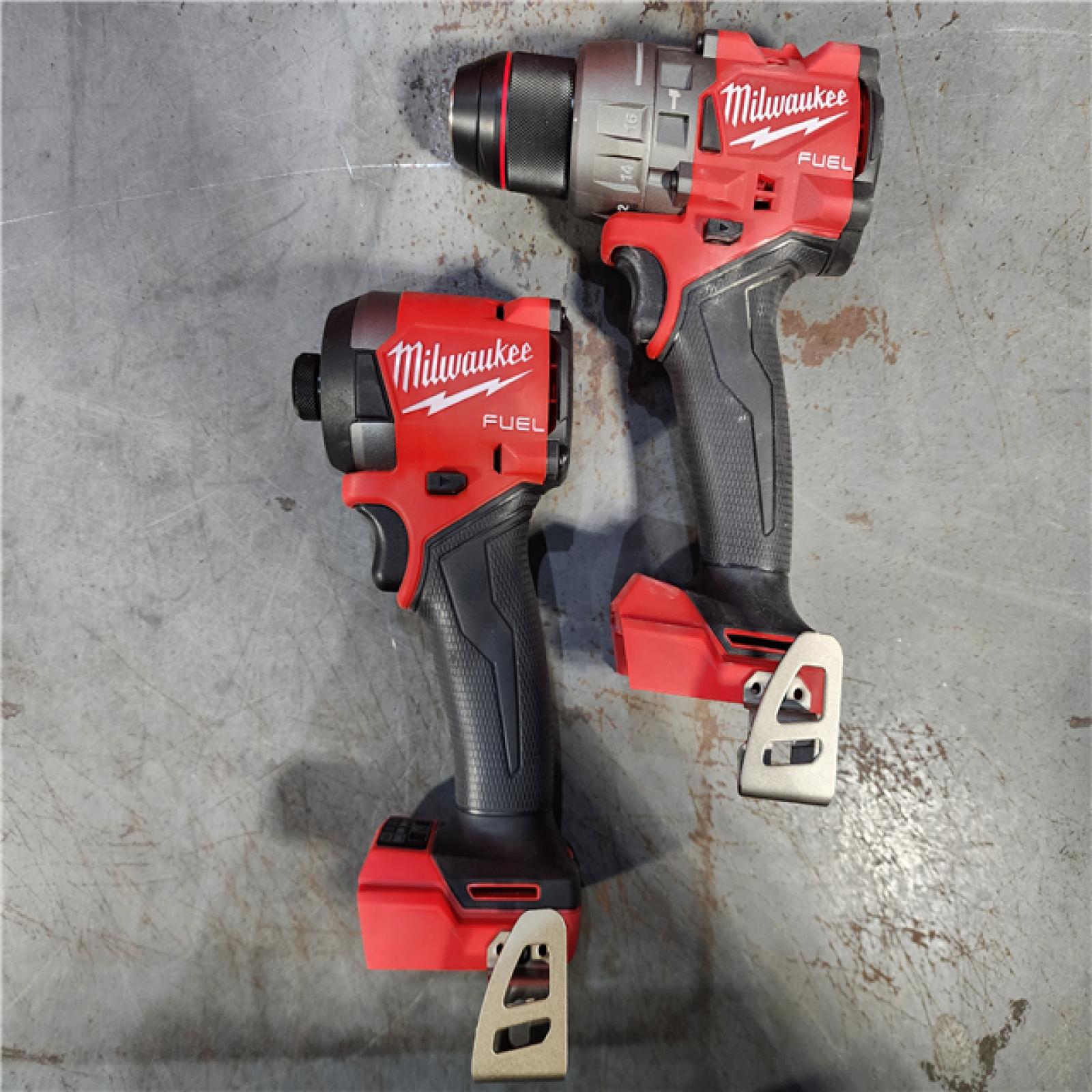 HOUSTON LOCATION - AS-IS Milwaukee M18 FUEL 18V Lithium-Ion Brushless Cordless Hammer Drill and Impact Driver Combo Kit (2-Tool) with 2 Batteries