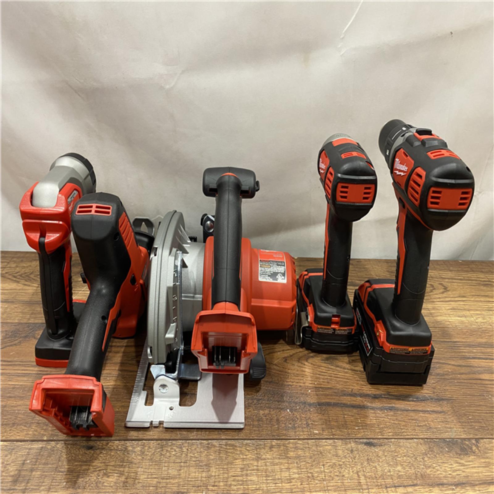 AS IS M18 18V Lithium-Ion Cordless Combo Kit (5-Tool) with (1) 3.0Ah and (1) 1.5Ah Battery, (1) Charger, (1) Tool Bag