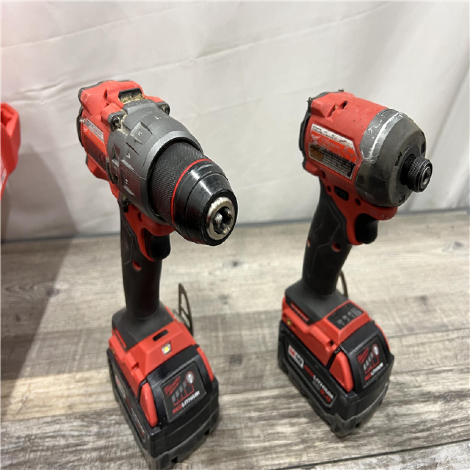 AS-IS Milwaukee M18 FUEL 18V Lithium-Ion Brushless Cordless Hammer Drill and Impact Driver Combo Kit (2-Tool) with 2 Batteries