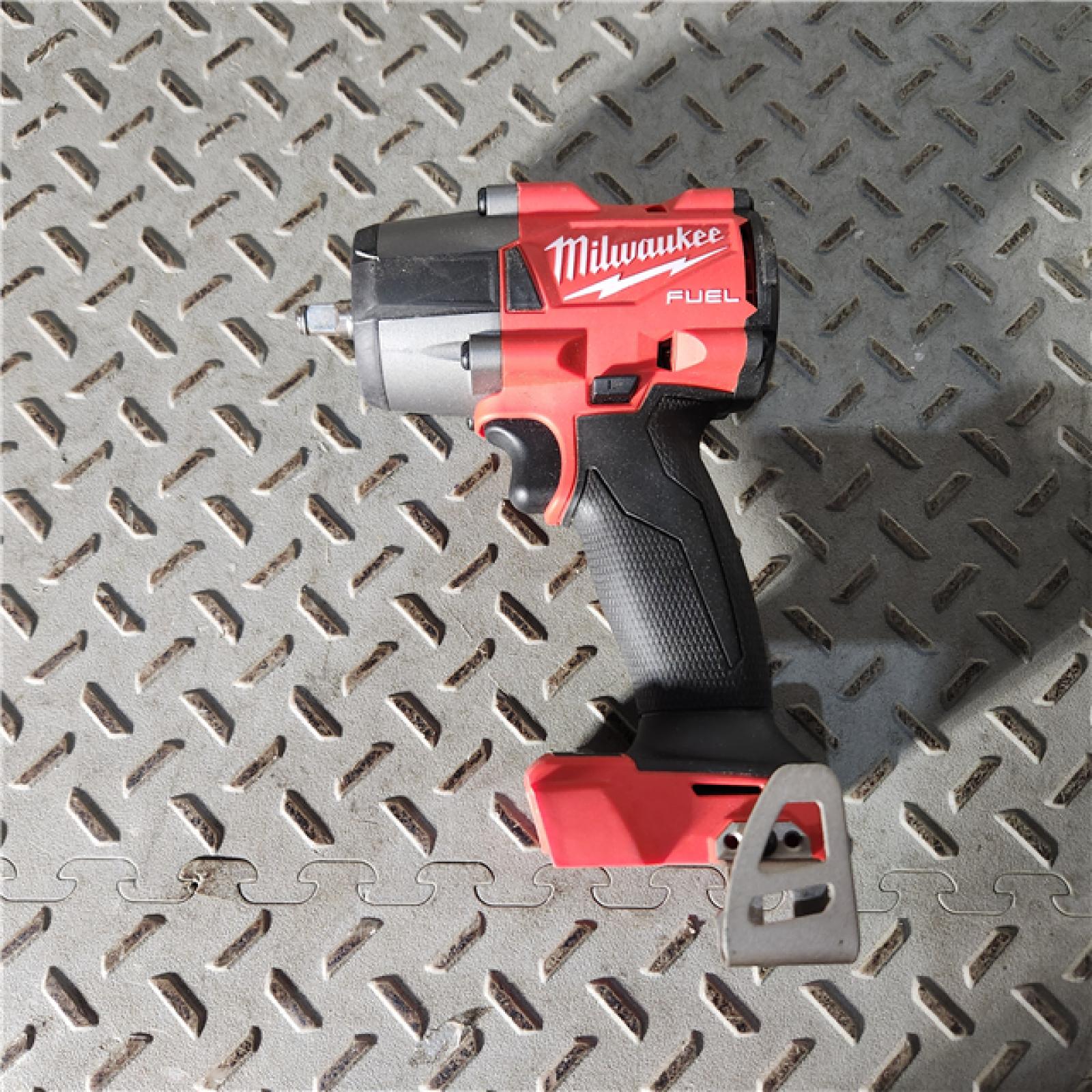 Houston location AS-IS Milwaukee M18 18V Fuel 3/8  Mid-Torque Compact Impact Wrench Brushless Cordless Lithium-Ion 2960-20