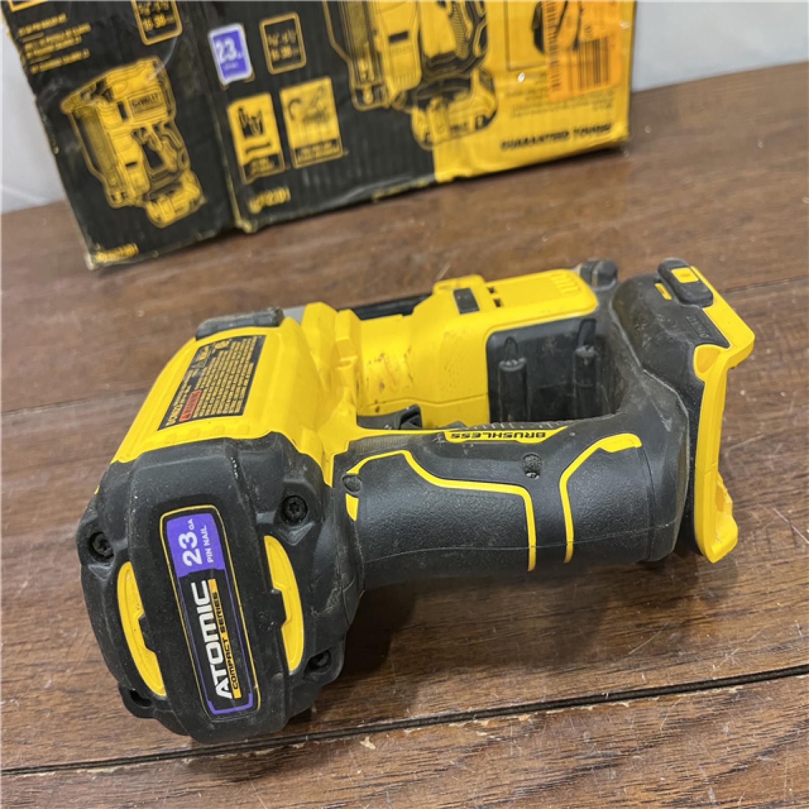 AS-ISDeWalt DCN623D1 20-Volt MAX Atomic Compact Cordless Pin Nailer Kit  Brushless Motor  23 Gauge  Battery - Quantity 1