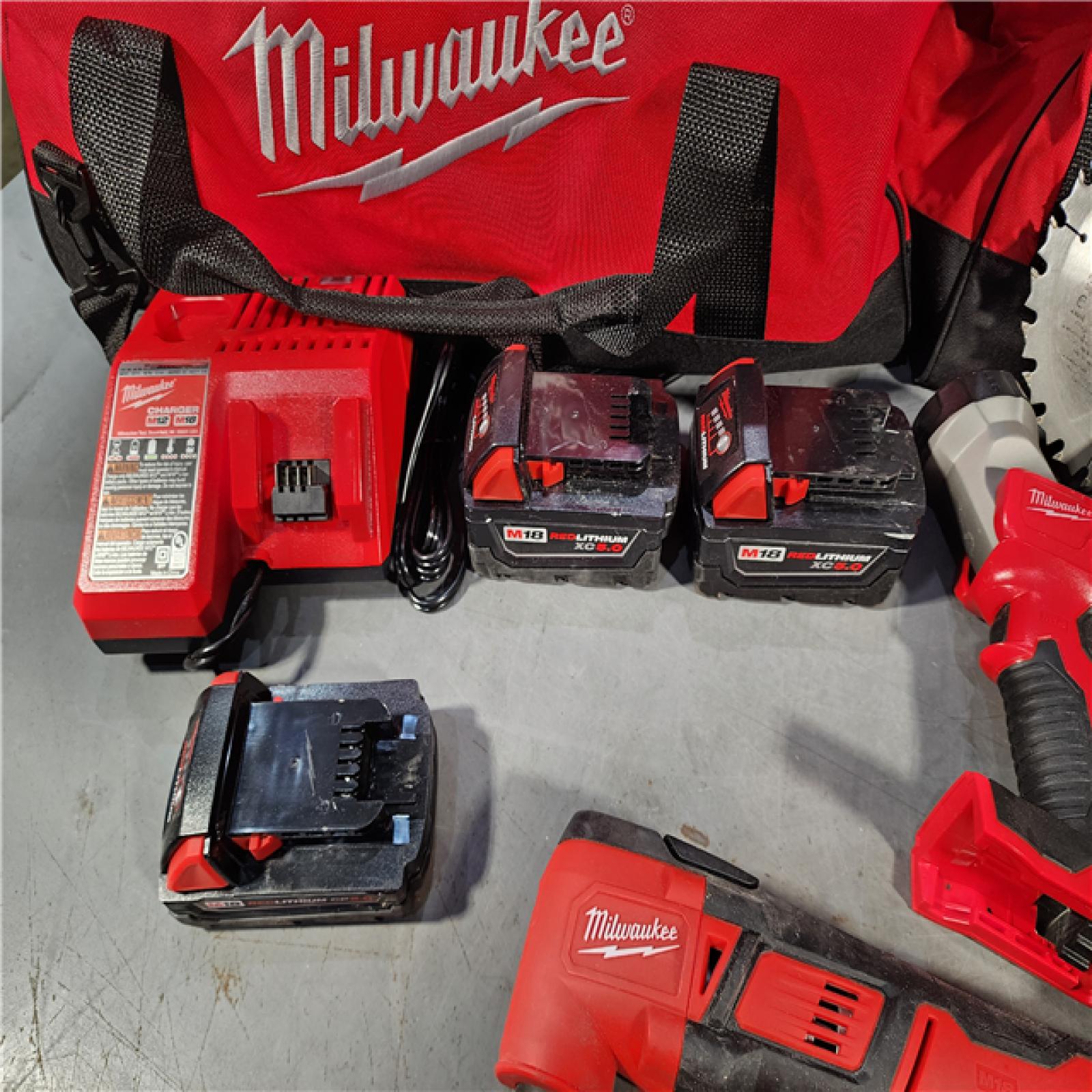 HOUSTON LOCATION - AS-IS M18 18V Lithium-Ion Cordless Combo Kit (8-Tool) with (3) Batteries, Charger and (2) Tool Bags