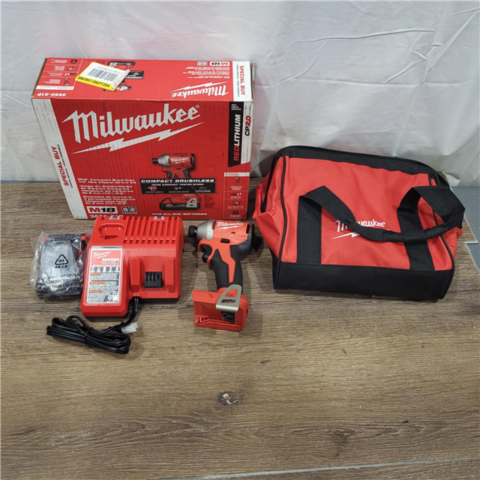 AS-IS Milwaukee M18 Compact Brushless 1/4  Hex Impact Driver Kit