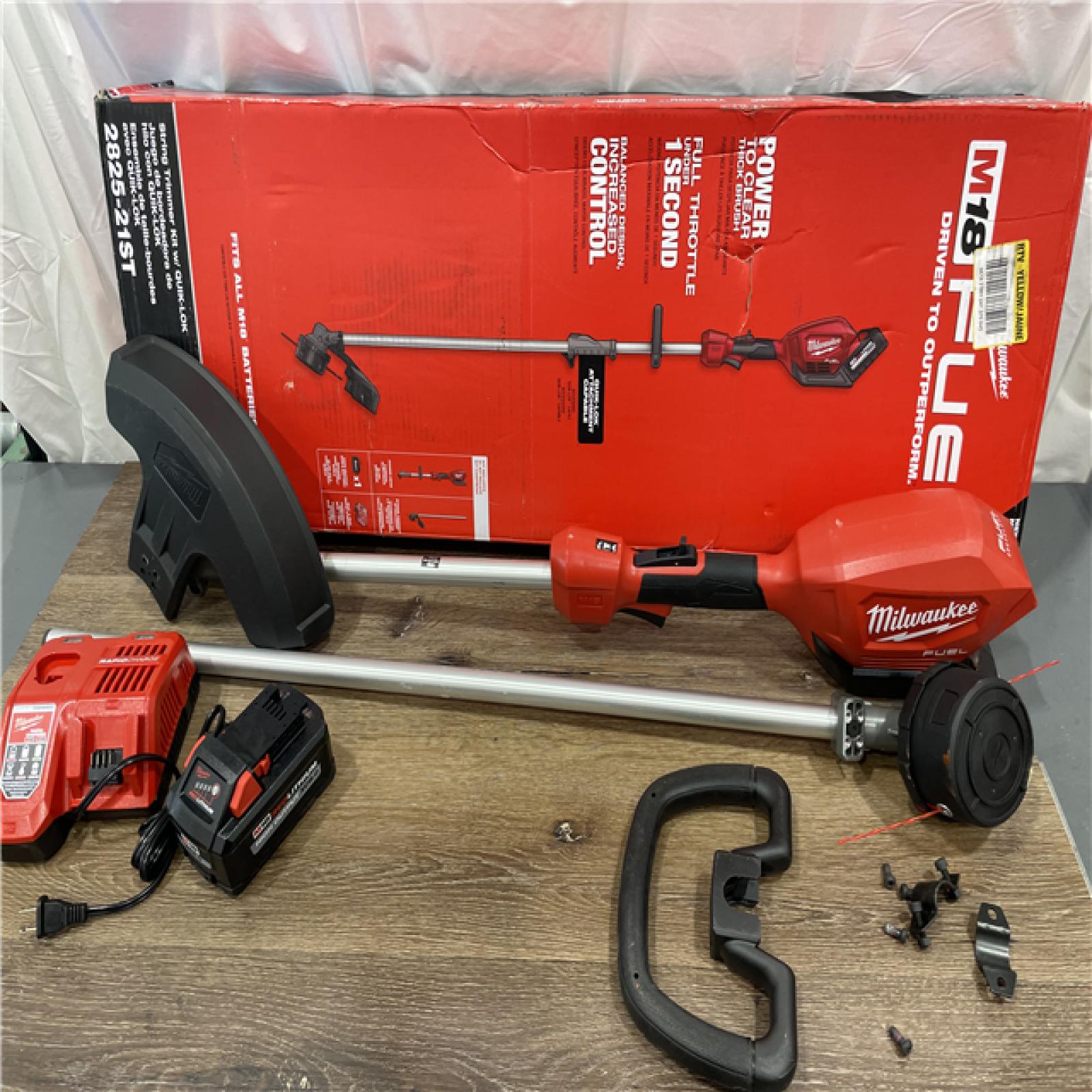 AS-IS Milwaukee M18 FUEL 18V Lithium-Ion Brushless Cordless String Trimmer with QUIK-LOK Attachment Capability and 8.0 Ah Battery