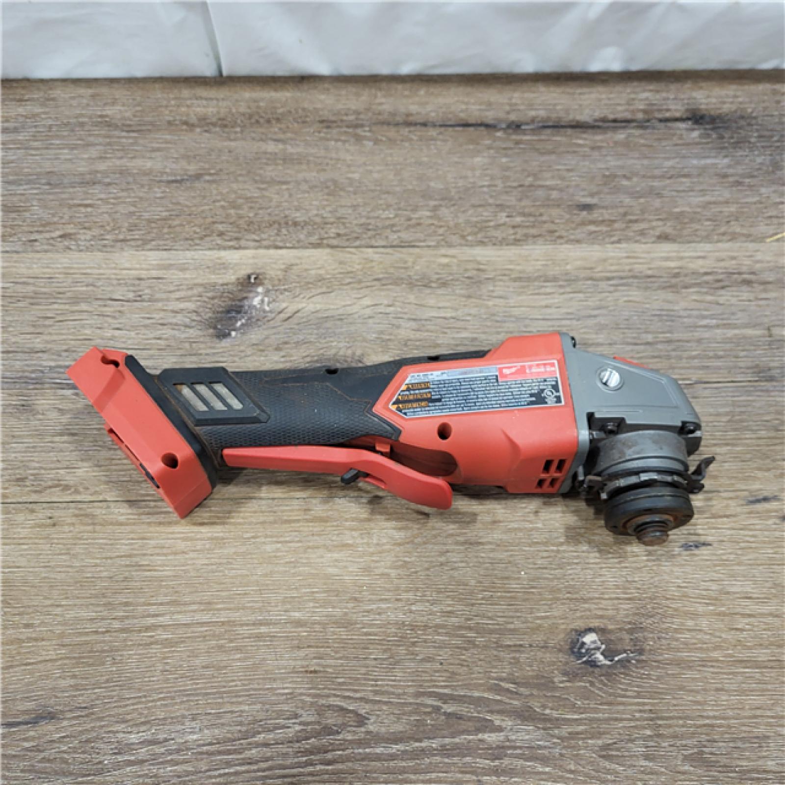 AS-IS Milwaukee 2880-20 M18 FUEL 18-Volt Lithium-Ion Brushless Cordless 4-1/2 in./5 in. Grinder W/Paddle Switch (Tool-Only)