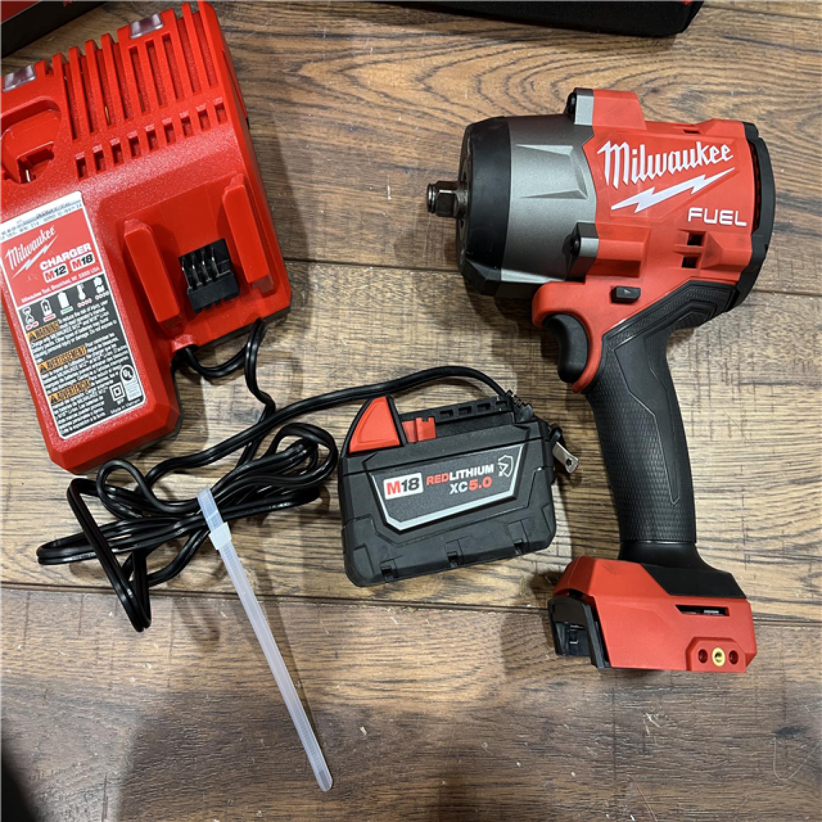 AS-IS Milwaukee M18 1/2 in. Cordless Brushless High Torque Impact Wrench Kit (Battery & Charger)