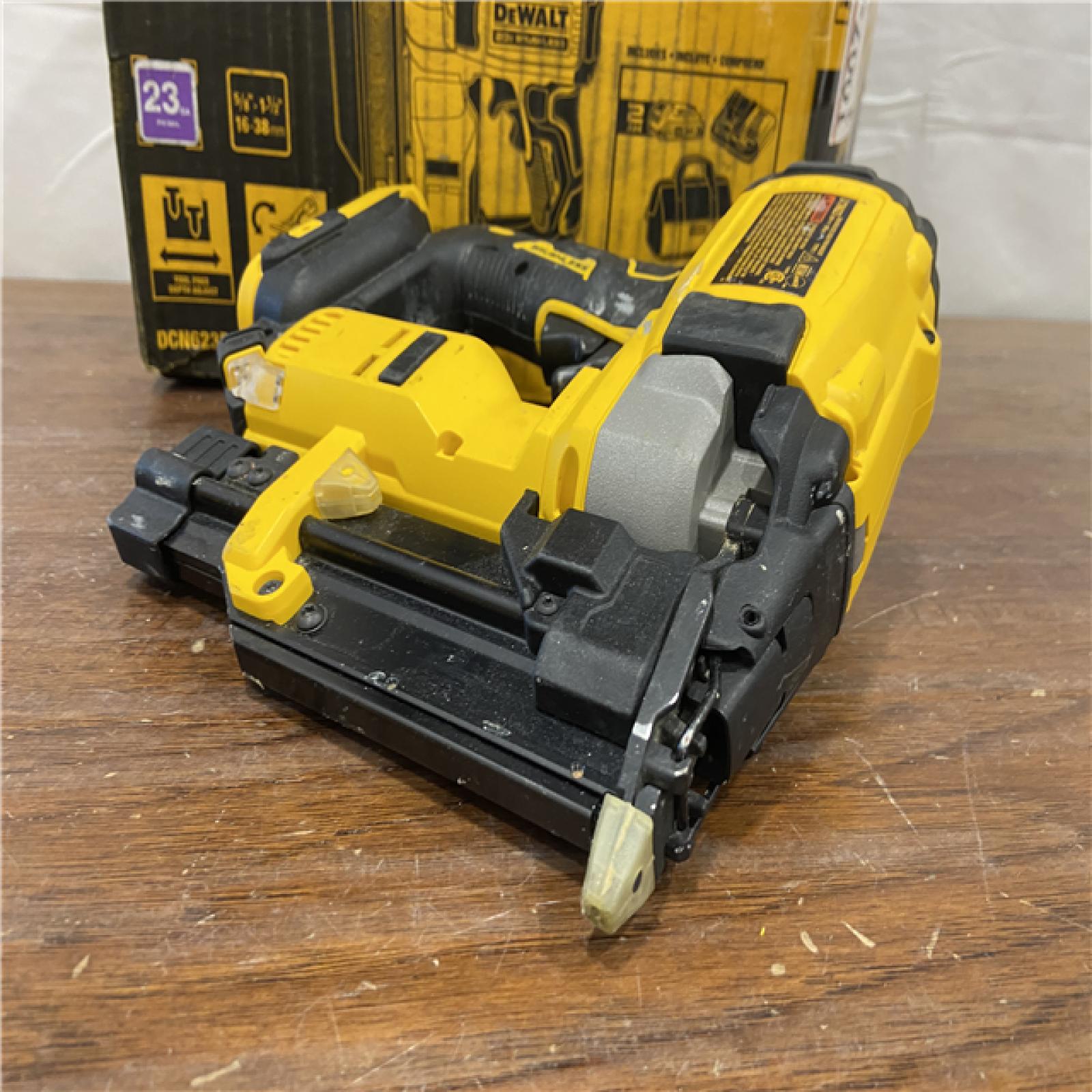 AS-IS DEWALT ATOMIC 20V MAX Lithium Ion Cordless 23 Gauge Pin Nailer Kit with 4.0Ah Battery and Charger