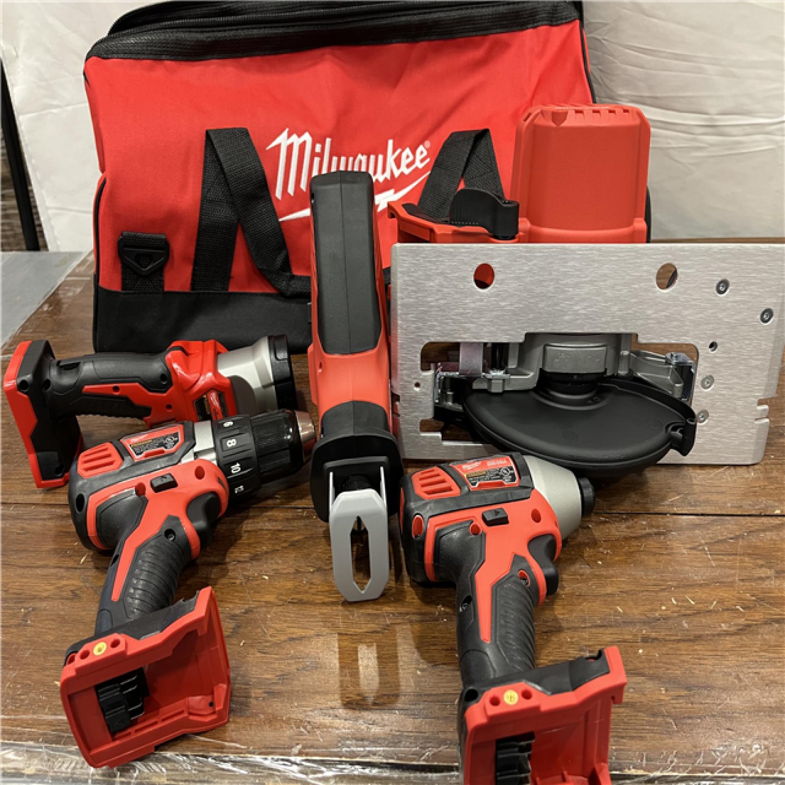 AS-IS M18 18V Lithium-Ion Cordless Combo Kit (5-Tool) with (1) 3.0Ah and (1) 1.5Ah Battery, (1) Charger, (1) Tool Bag