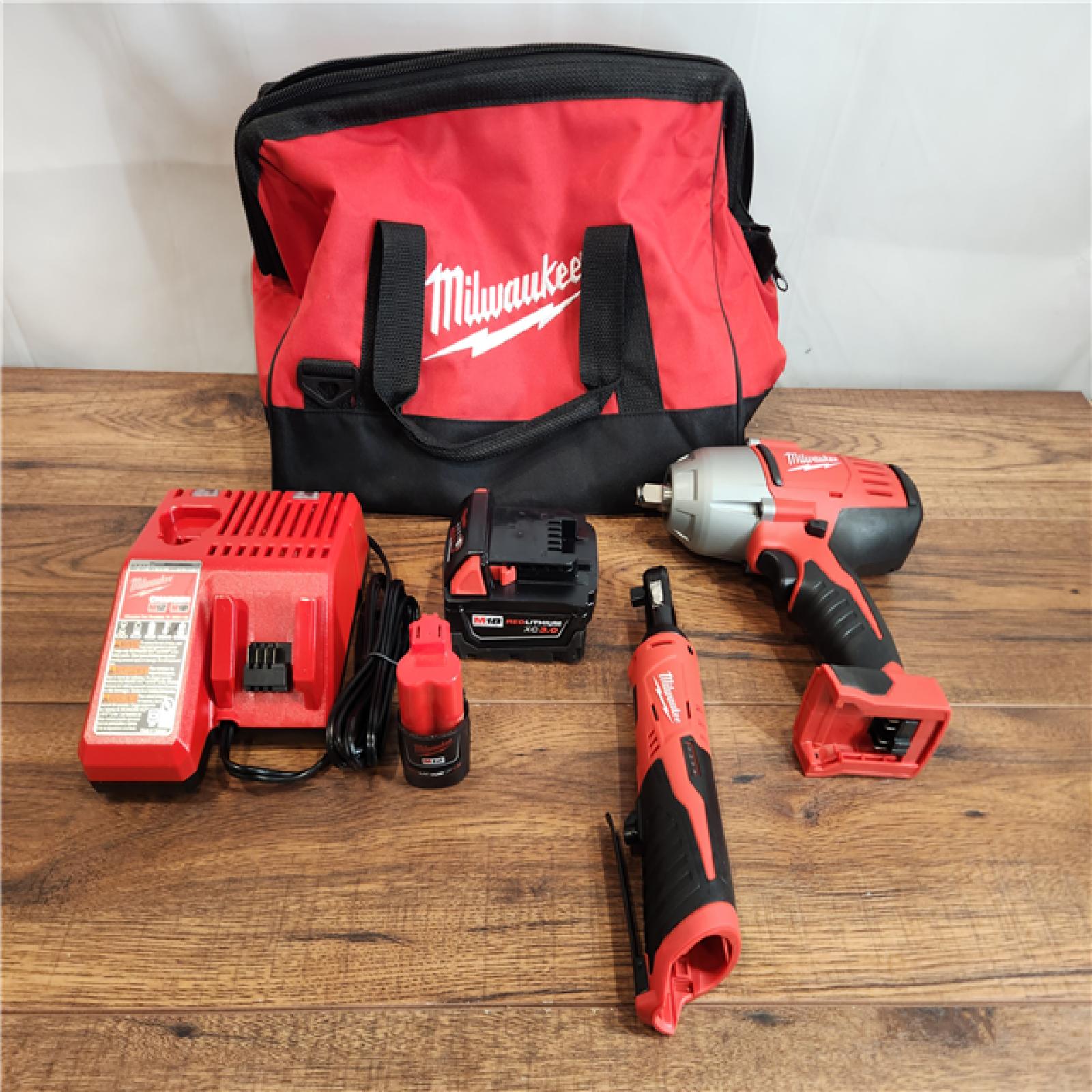 AS-IS Milwaukee M18/M12 Lithium-Ion Cordless 3/8 in. Ratchet and 1/2 in ...