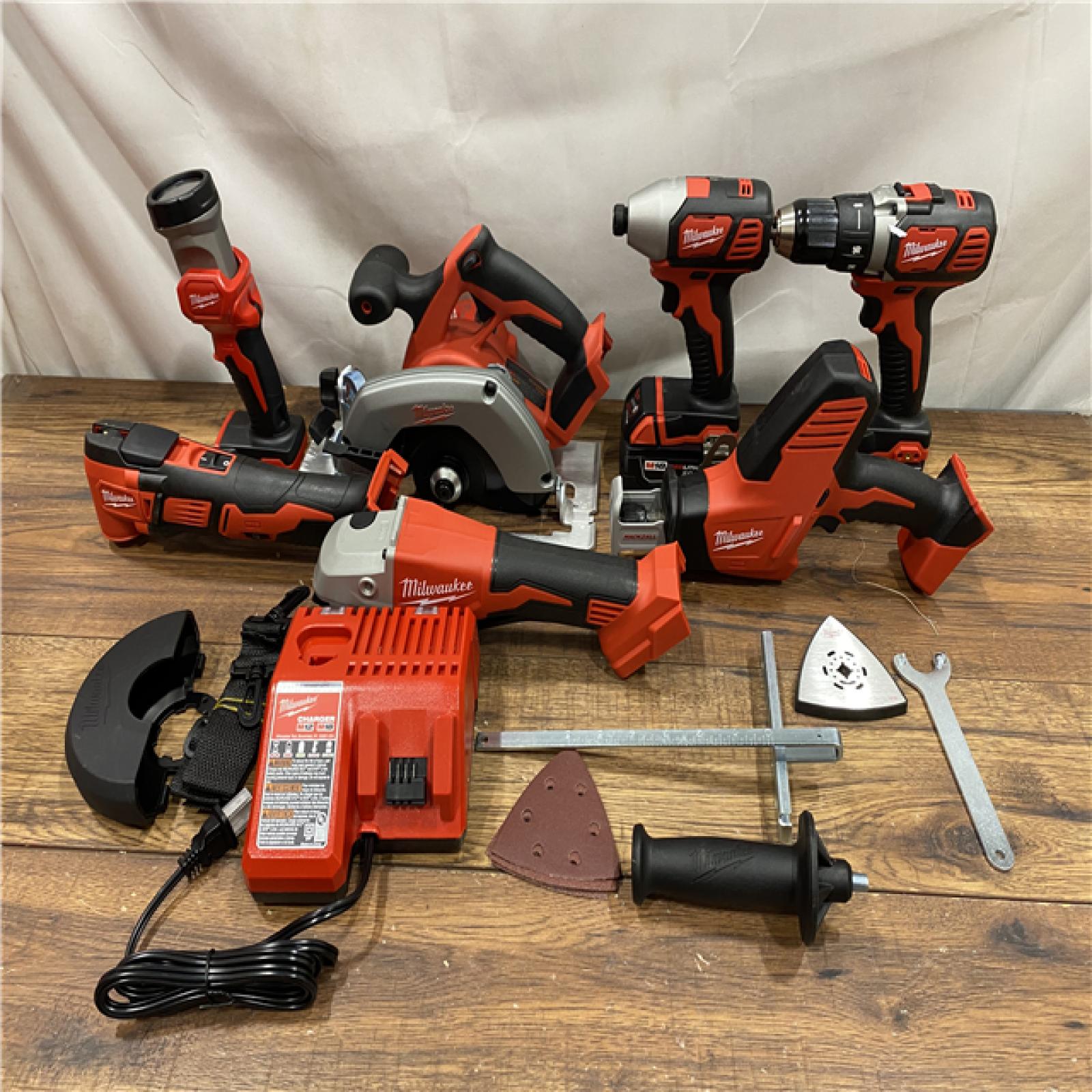 AS IS Milwaukee M18 18-Volt Lithium-Ion Cordless Combo Kit 7-Tool with 2-Batteries, Charger and Tool Bag