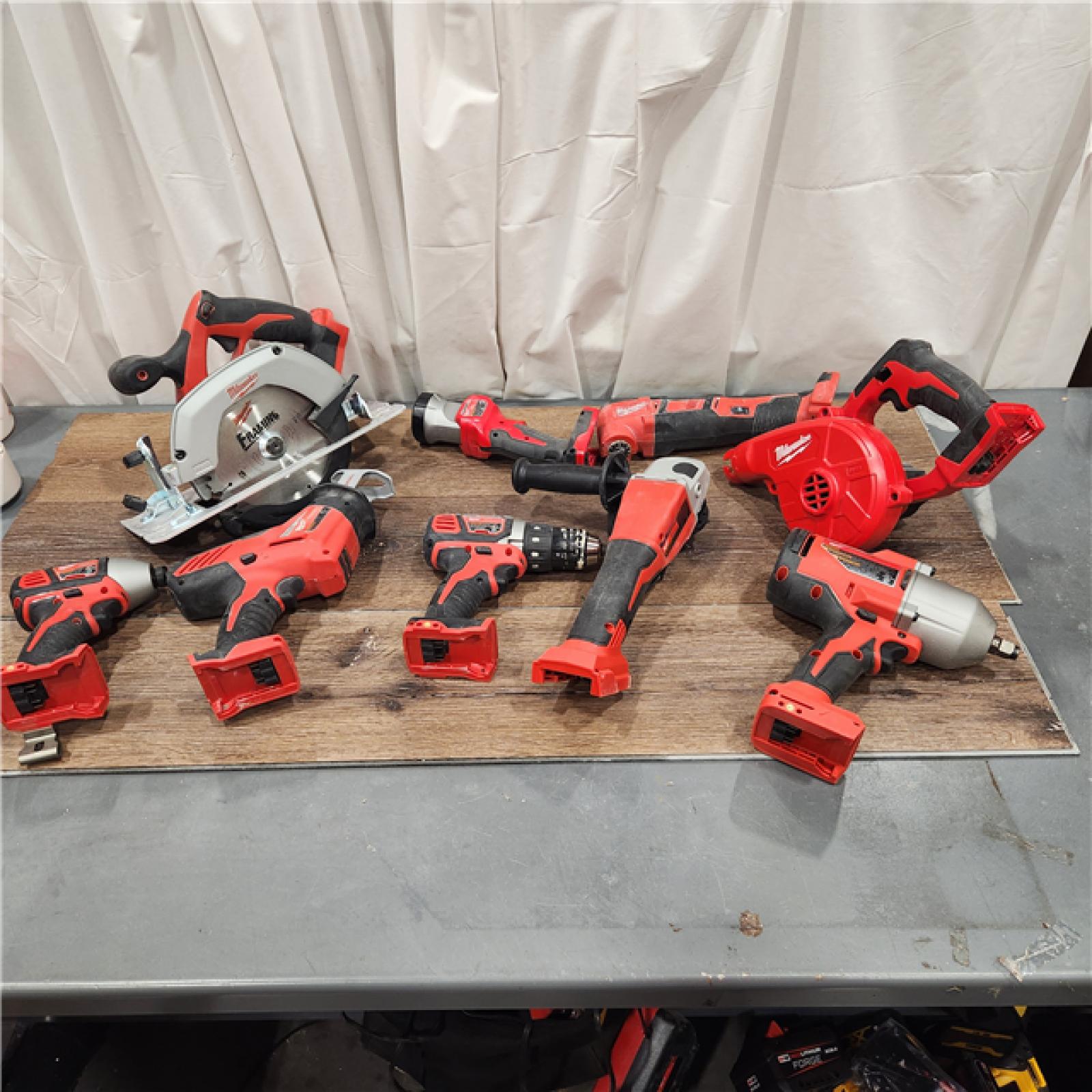 AS-IS M18 18-Volt Lithium-Ion Cordless Combo Kit (9-Tool) with (2) Batteries, Charger, and Tool Bag