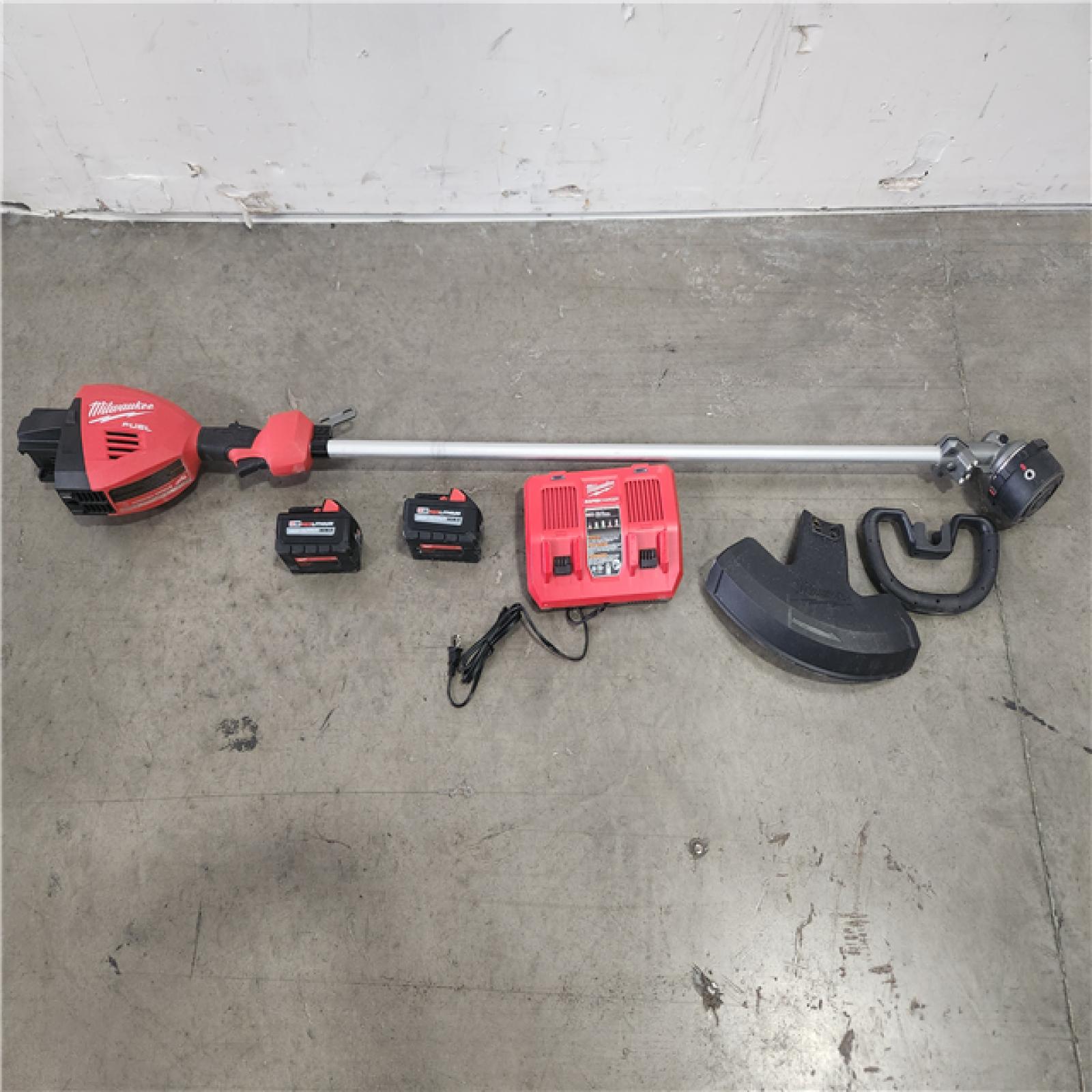 Phoenix Location Milwaukee M18 FUEL 18V Brushless Cordless 17 in. Dual Battery Straight Shaft String Trimmer with (2) 8.0 Ah Batteries and Charger