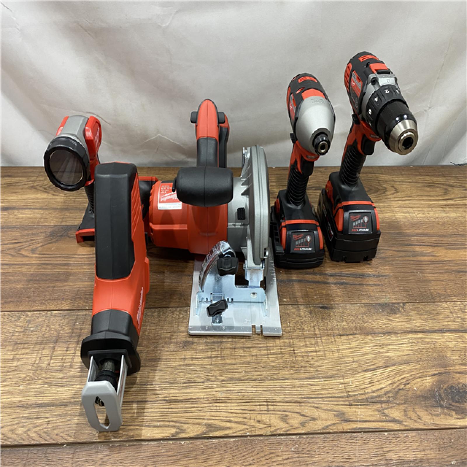 AS IS M18 18V Lithium-Ion Cordless Combo Kit (5-Tool) with (1) 3.0Ah and (1) 1.5Ah Battery, (1) Charger, (1) Tool Bag