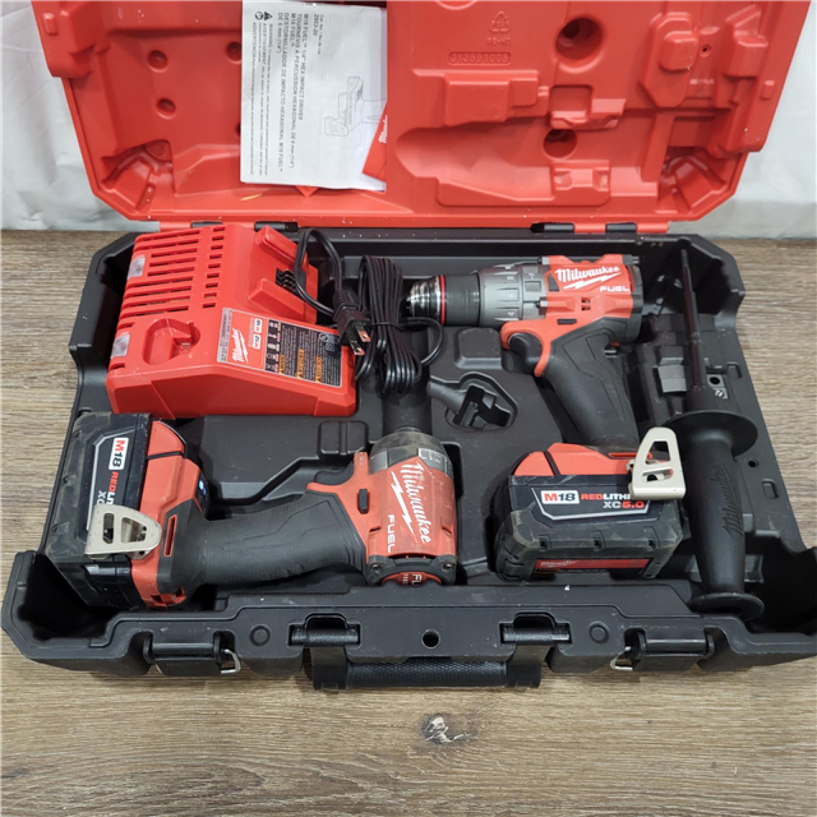 AS-IS M18 FUEL 18V Lithium-Ion Brushless Cordless Hammer Drill and Impact Driver Combo Kit (2-Tool) with 2 Batteries