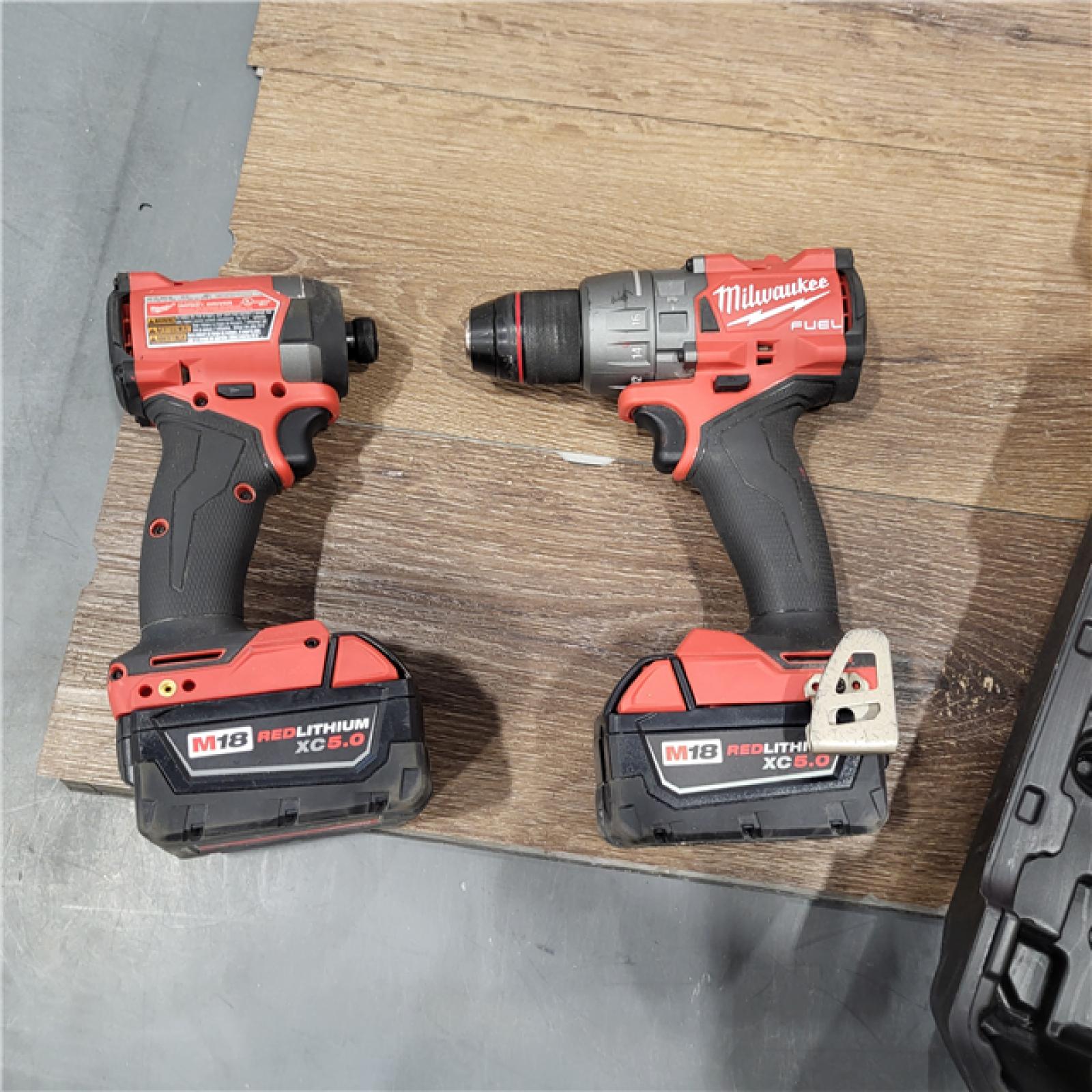 AS-IS Milwaukee M18 FUEL 18V Lithium-Ion Brushless Cordless Hammer Drill and Impact Driver Combo Kit (2-Tool) with 2 Batteries