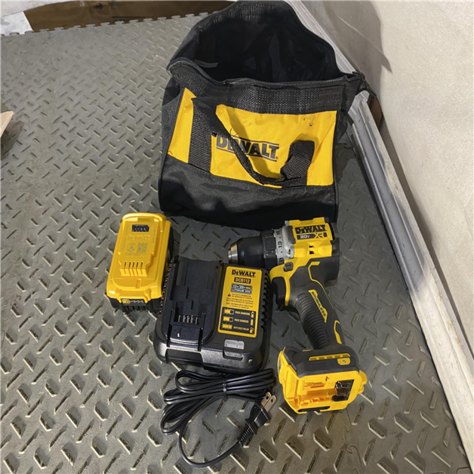 Houston location AS-IS DEWALT 20V MAX XR Lithium-Ion Cordless Compact 1/2 in. Drill/Driver Kit, 20V MAX 5.0Ah Battery, and Charger