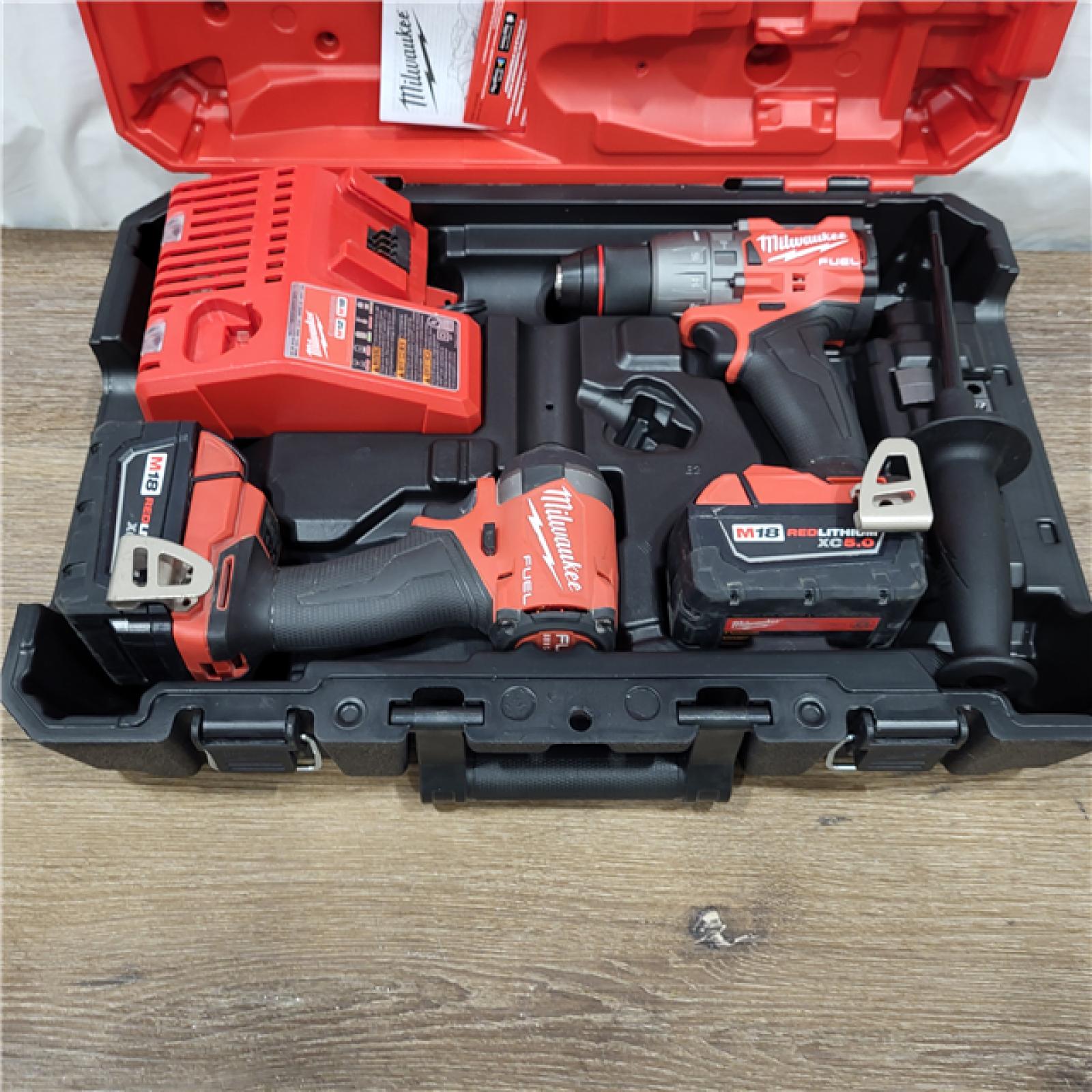 AS-IS M18 FUEL 18V Lithium-Ion Brushless Cordless Hammer Drill and Impact Driver Combo Kit (2-Tool) with 2 Batteries