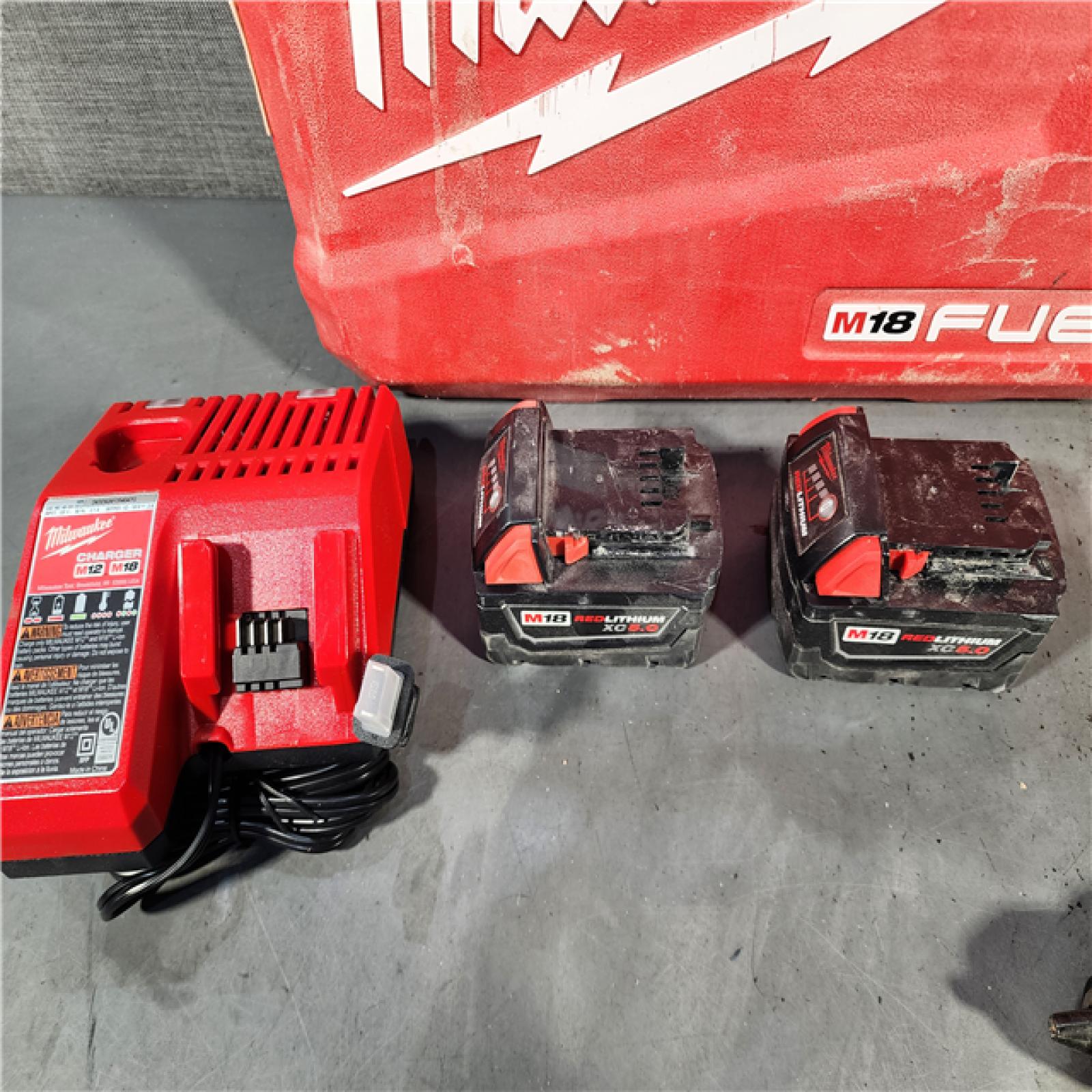 HOUSTON LOCATION - AS-IS Milwaukee M18 FUEL 18V Lithium-Ion Brushless Cordless Hammer Drill and Impact Driver Combo Kit (2-Tool) with 2 Batteries