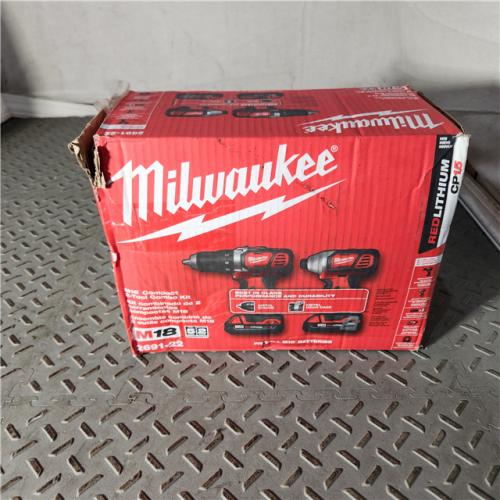 Houston location AS-IS MILWAUKEE M18 18V Lithium-Ion Cordless Drill Driver/Impact Driver Combo Kit (2-Tool) W/ Two 1.5Ah Batteries, Charger Tool Bag