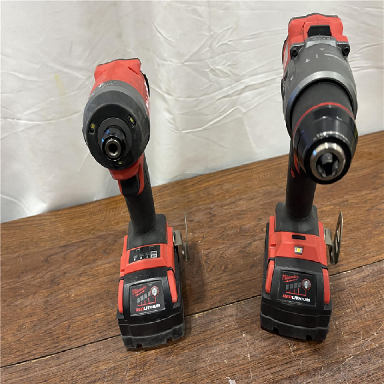 AS-ISMilwaukee M18 FUEL 18V Lithium-Ion Brushless Cordless Hammer Drill and Impact Driver Combo Kit (2-Tool) with 2 Batteries