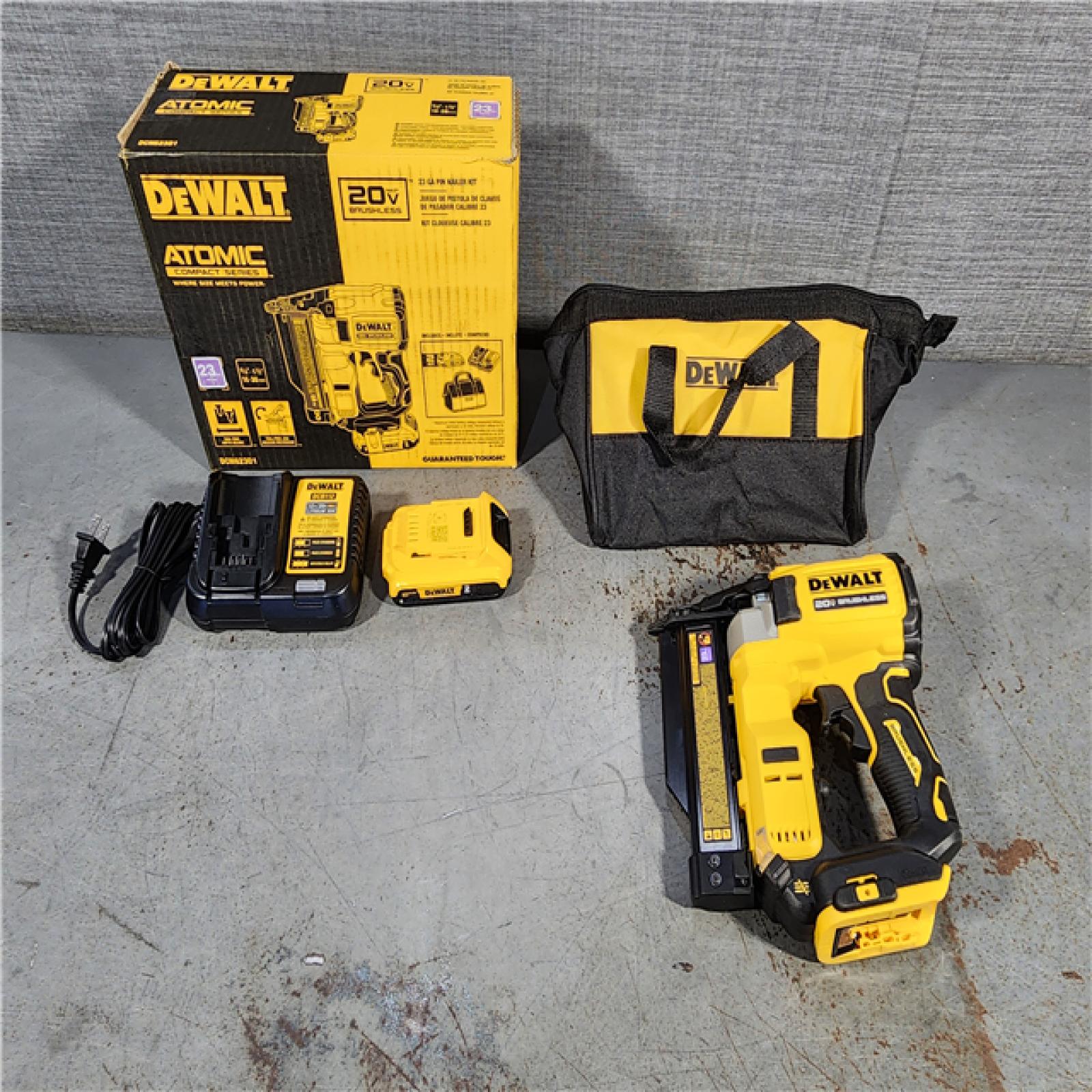 HOUSTON LOCATION - AS-IS DEWALT ATOMIC 20V MAX Lithium Ion Cordless 23 Gauge Pin Nailer Kit with 2.0Ah Battery and Charger