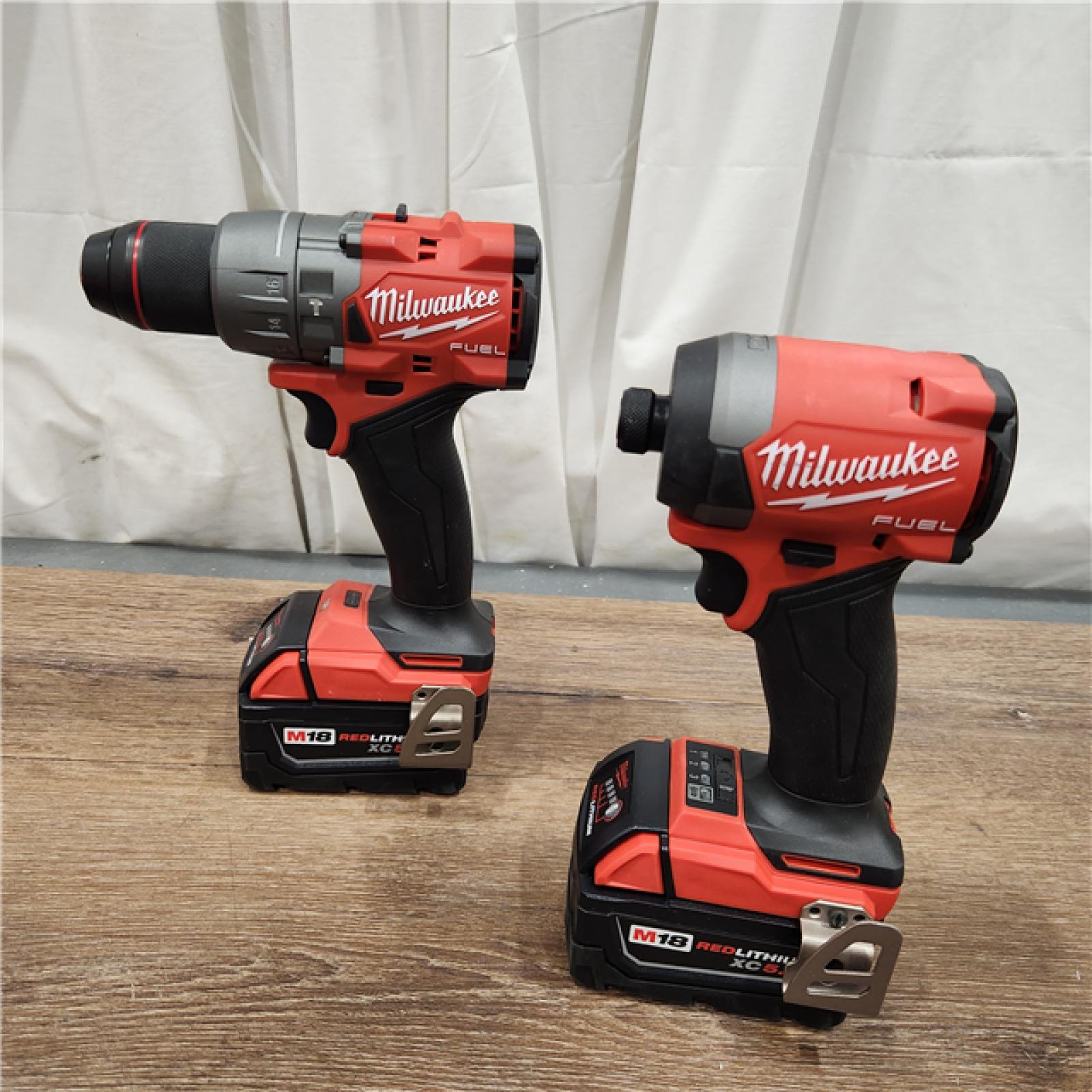 AS-IS Milwaukee M18 FUEL 18V Lithium-Ion Brushless Cordless Hammer Drill and Impact Driver Combo Kit (2-Tool) with 2 Batteries