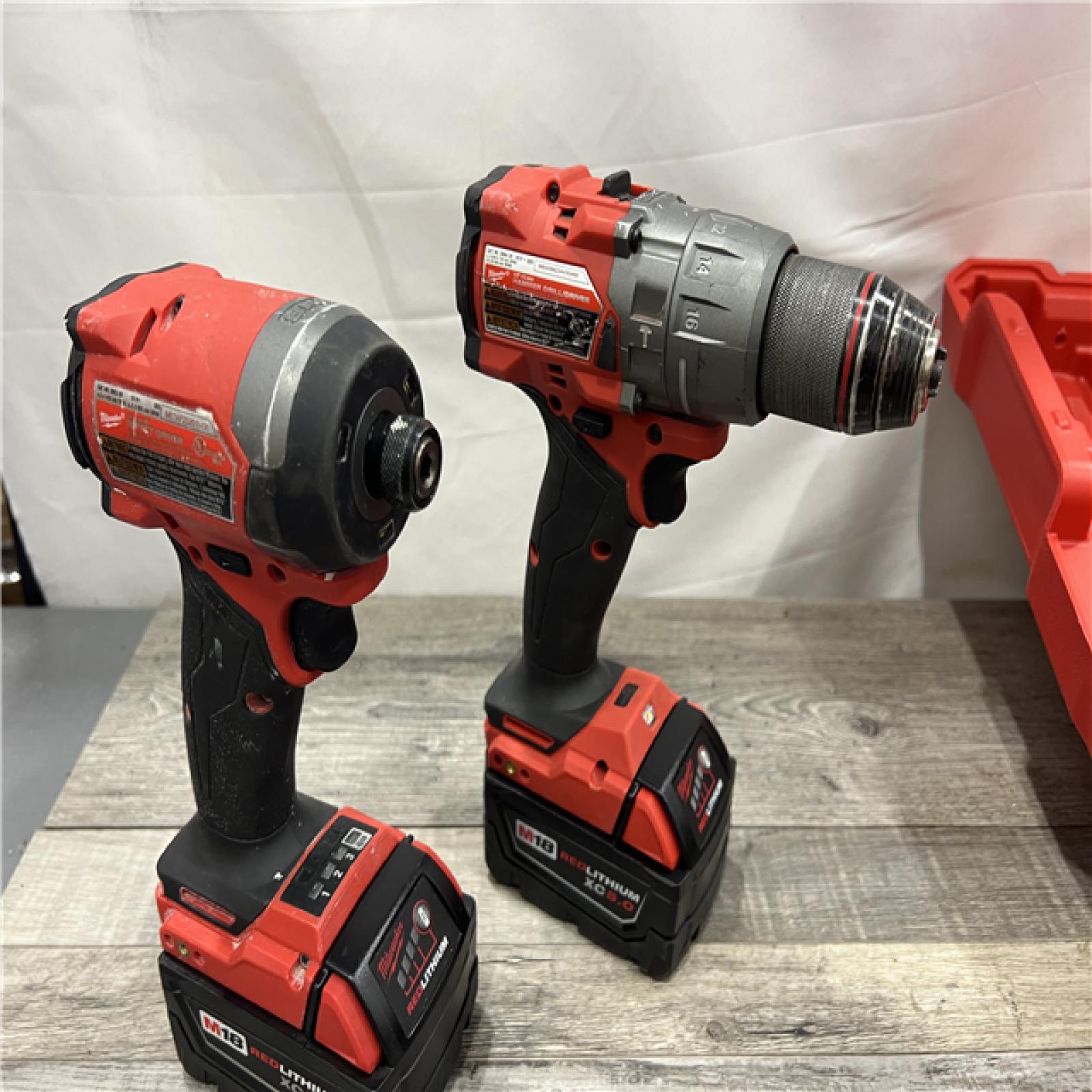 AS-IS MILWAUKEE M18 FUEL 18V Lithium-Ion Brushless Cordless Hammer Drill and Impact Driver Combo Kit (2-Tool) with 2 Batteries