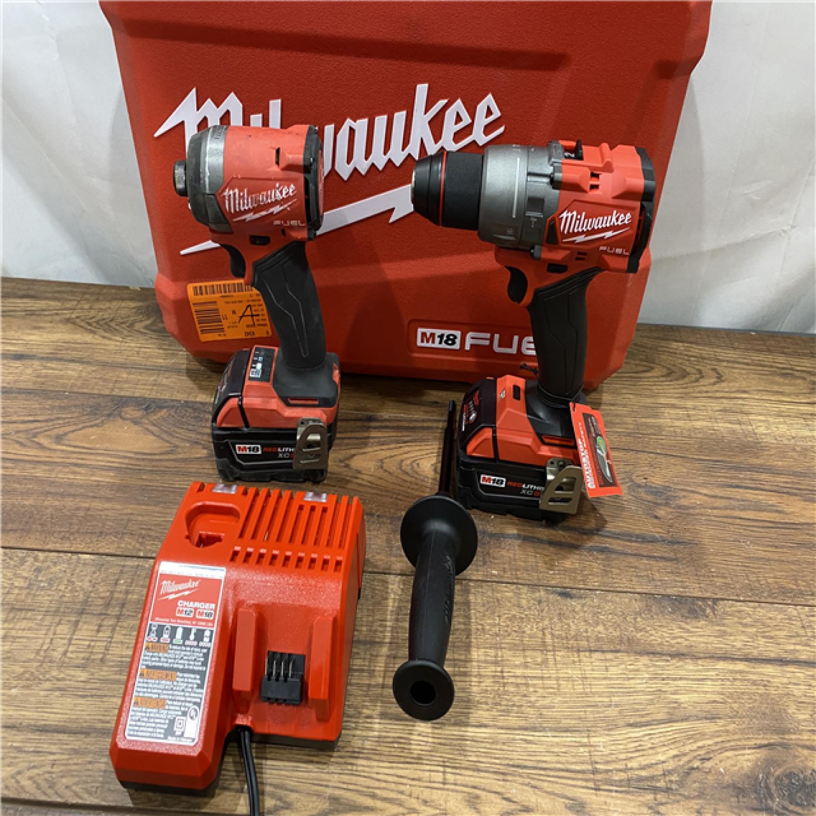 AS IS Milwaukee M18 FUEL 18V Lithium-Ion Brushless Cordless Hammer Drill and Impact Driver Combo Kit (2-Tool) with 2 Batteries