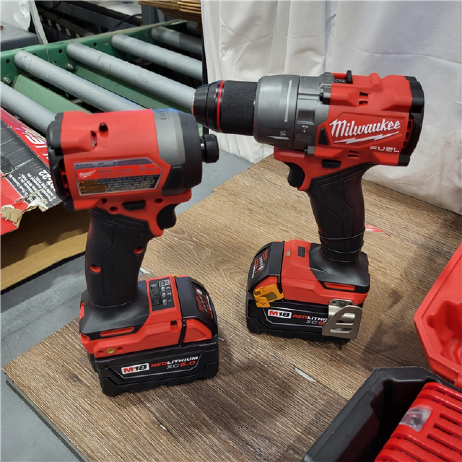 AS-IS Milwaukee M18 FUEL 18V Lithium-Ion Brushless Cordless Hammer Drill and Impact Driver Combo Kit (2-Tool) with 2 Batteries