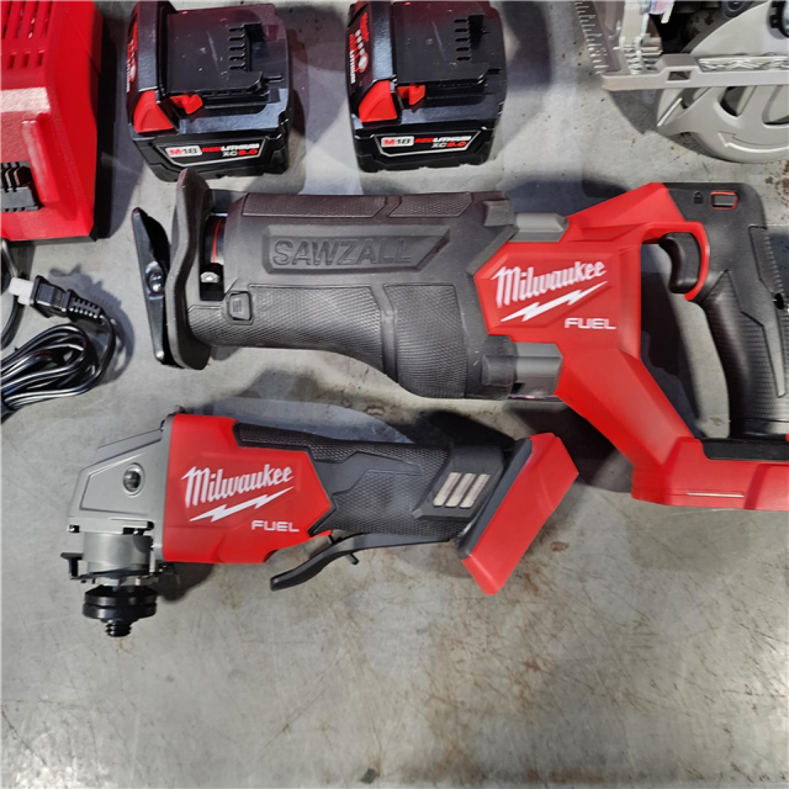 HOUSTON LOCATION - AS-IS (APPEARS LIKE NEW) MILWAUKEE 7 TOOL COMBO KIT W/ (2) 5.0 AH BATTERY, (2) CARRYING BAG & CHARGER