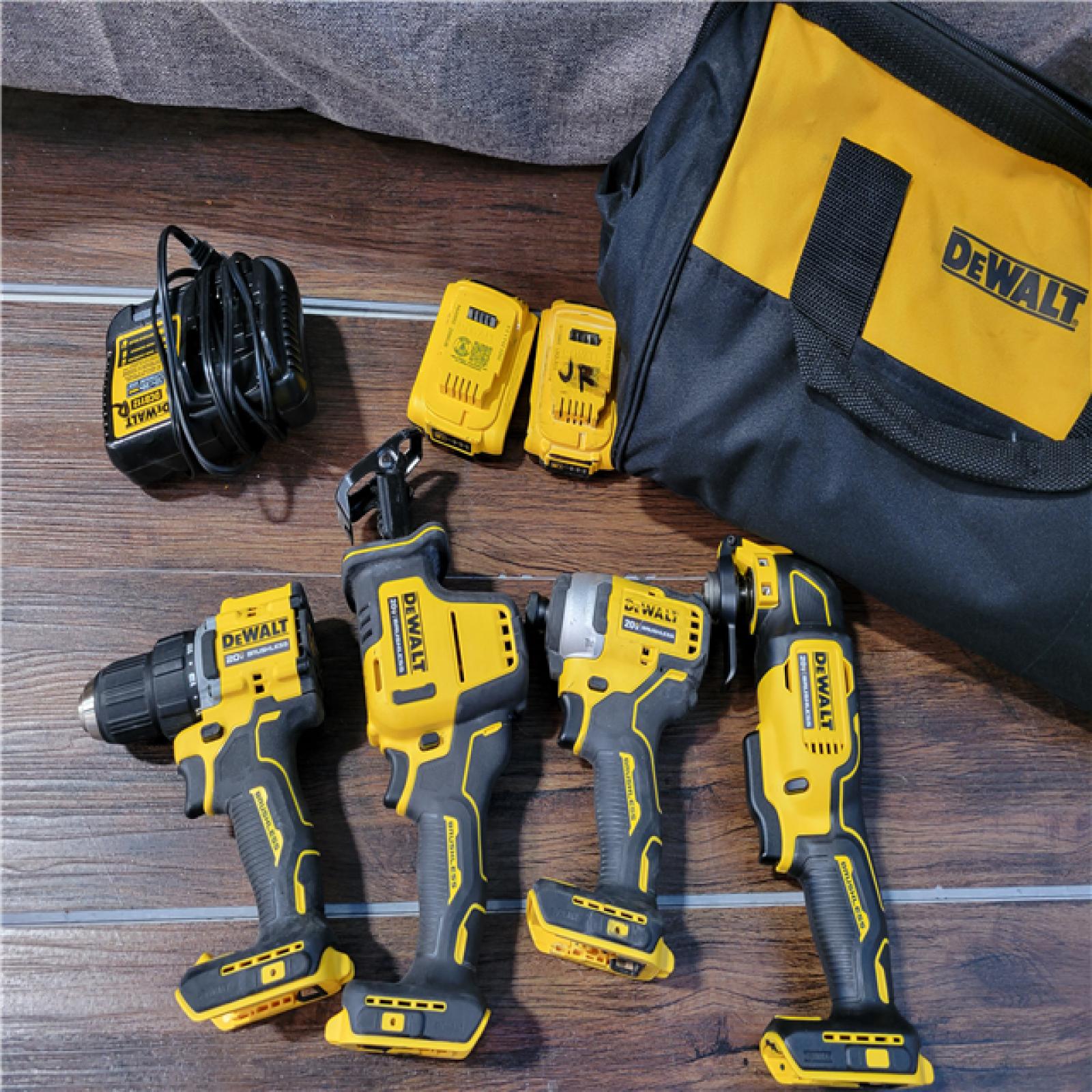 California As-Is Dewalt Brushless 4-Tool Combo Kit (Battery,Charger, and Tool Bag Included)