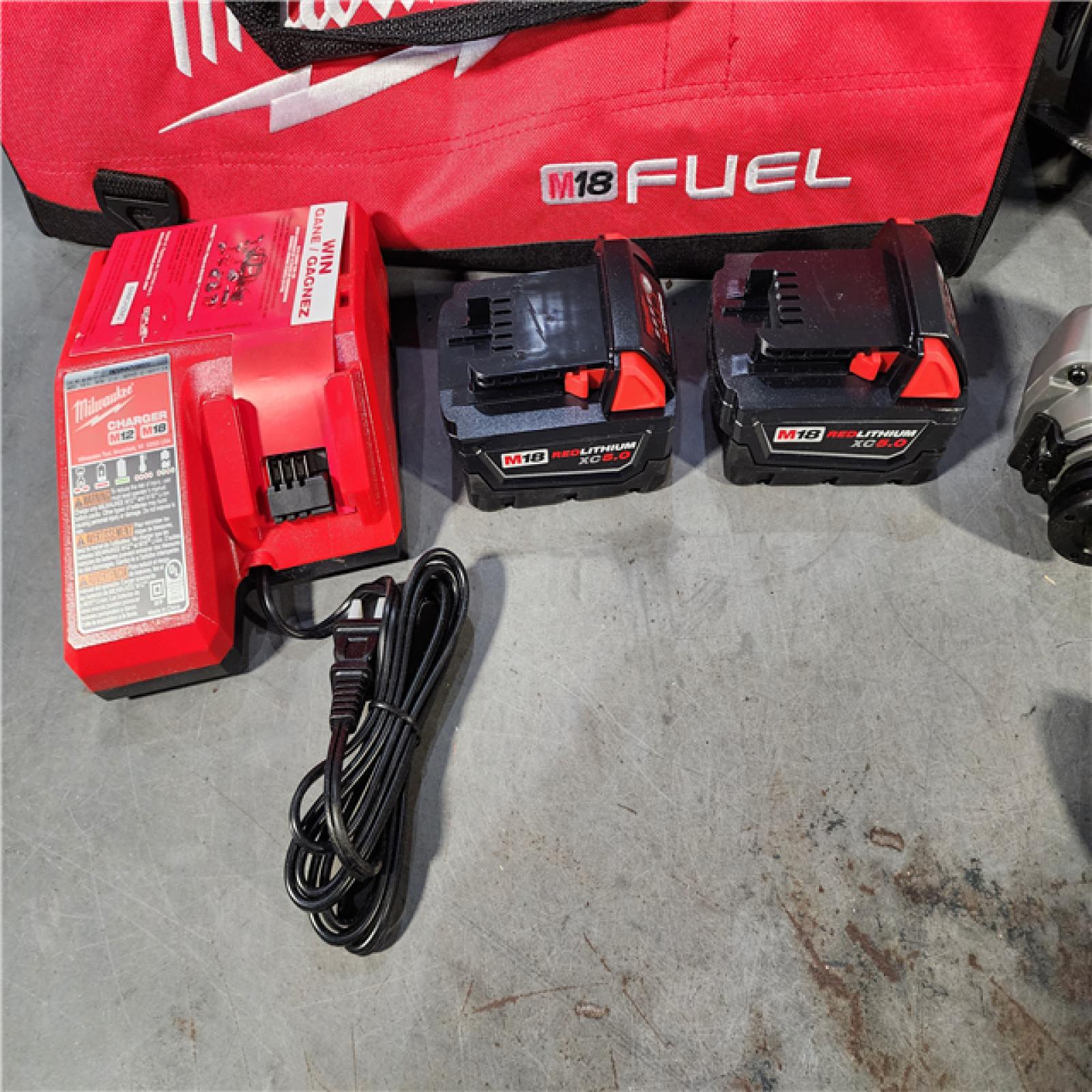 HOUSTON LOCATION - AS-IS (APPEARS LIKE NEW) M18 18-Volt Lithium-Ion Brushless Cordless FUEL Combo Kit (5-Tool) with 2-Batteries, 1-Charger, and Tool Bag