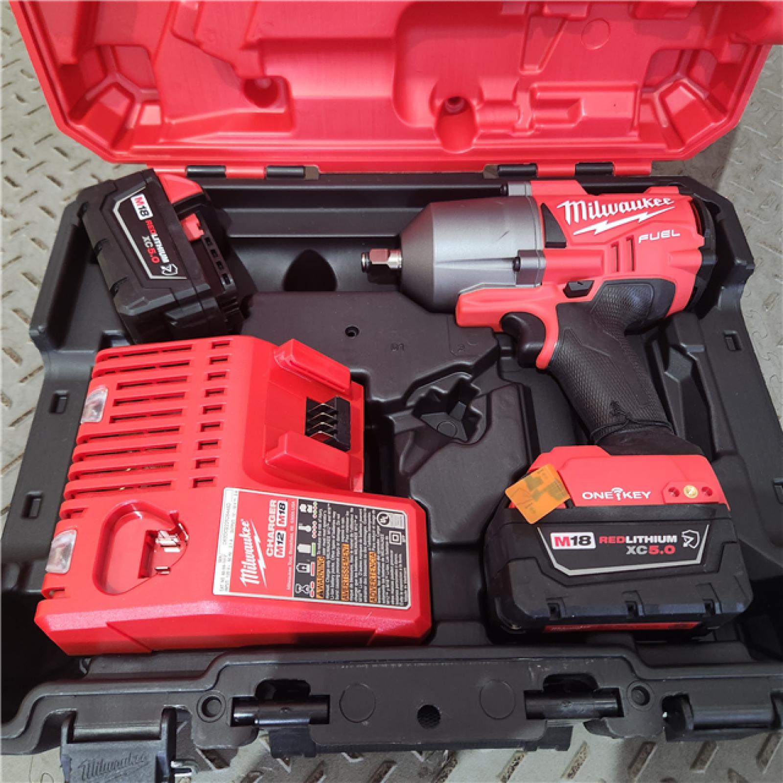 Houston location AS-IS MILWUAKEE M18 FUEL ONE-KEY 18V Li-Ion Brushless Cordless 1/2 in. High-Torque Impact Wrench with Friction Ring, Resistant Batteries