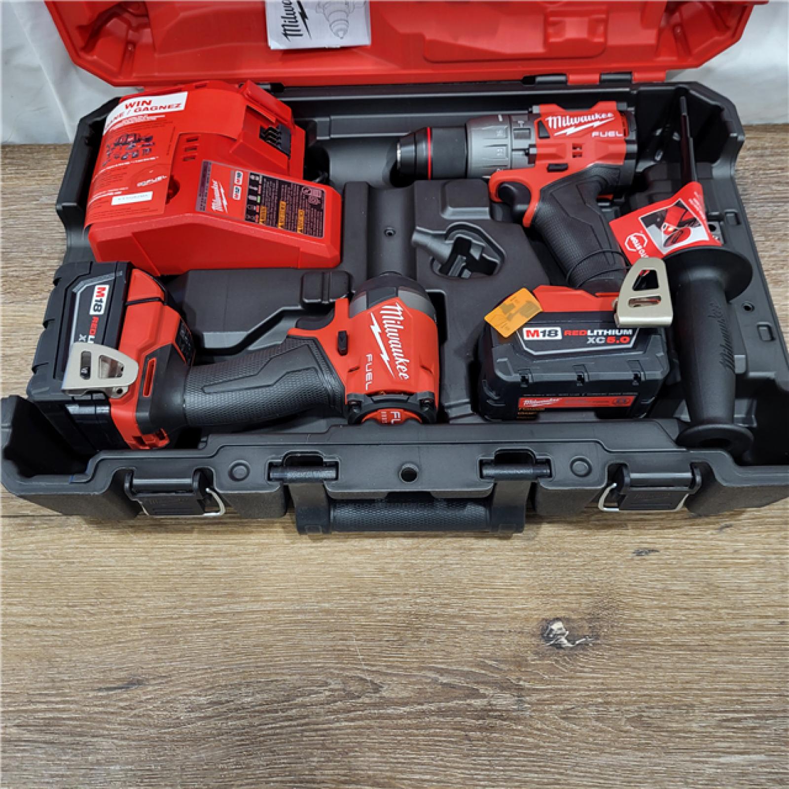 AS-IS M18 FUEL 18V Lithium-Ion Brushless Cordless Hammer Drill and Impact Driver Combo Kit (2-Tool) with 2 Batteries