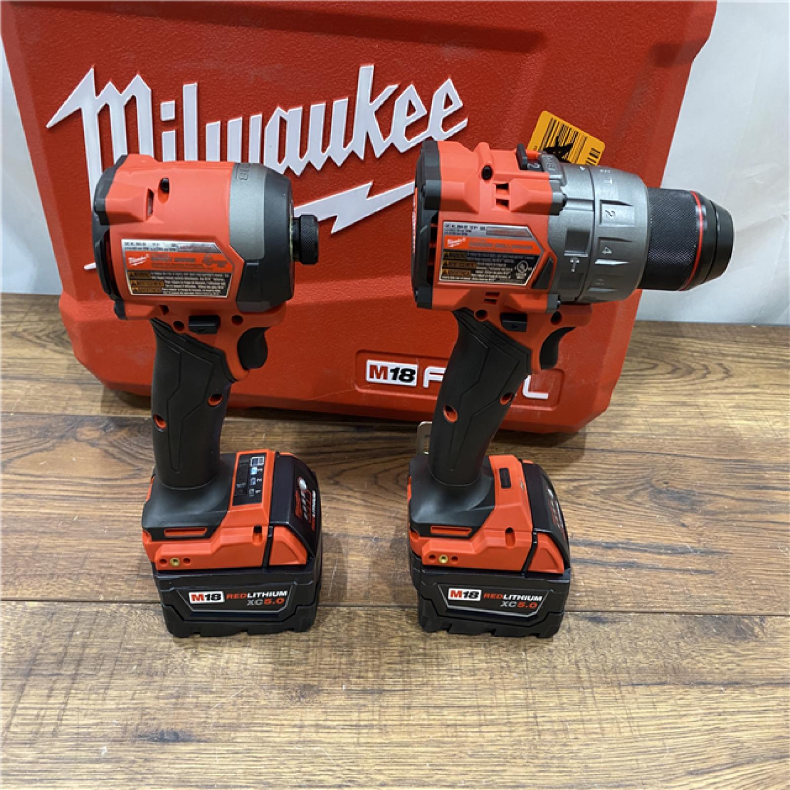 AS IS Milwaukee M18 FUEL 18V Lithium-Ion Brushless Cordless Hammer Drill and Impact Driver Combo Kit (2-Tool) with 2 Batteries