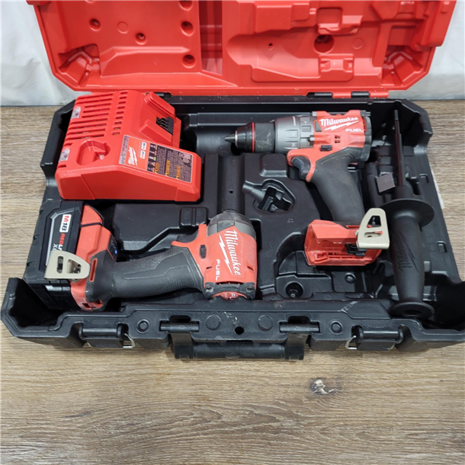 AS-IS M18 FUEL 18V Lithium-Ion Brushless Cordless Hammer Drill and Impact Driver Combo Kit (2-Tool) with 2 Batteries